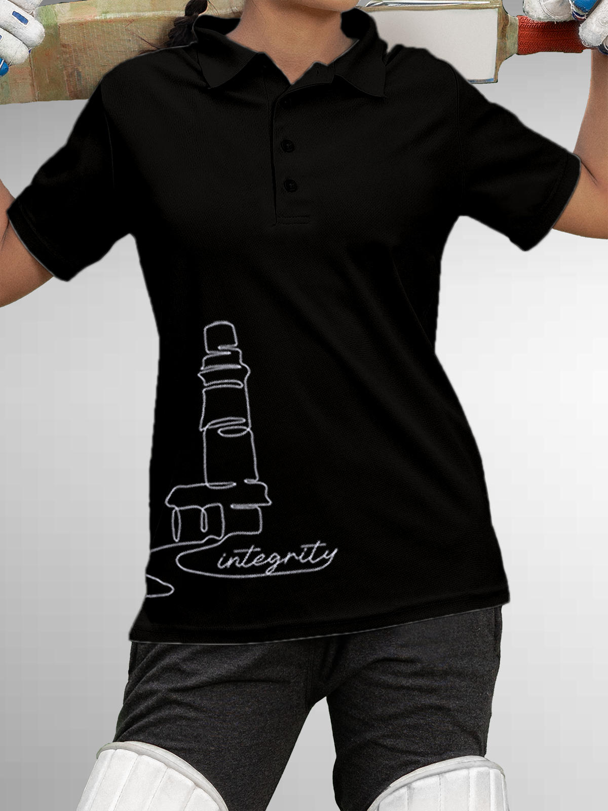 Model wearing Women's Black Polo T-shirt with 'Integrity' design, offering effortless style and premium comfort
