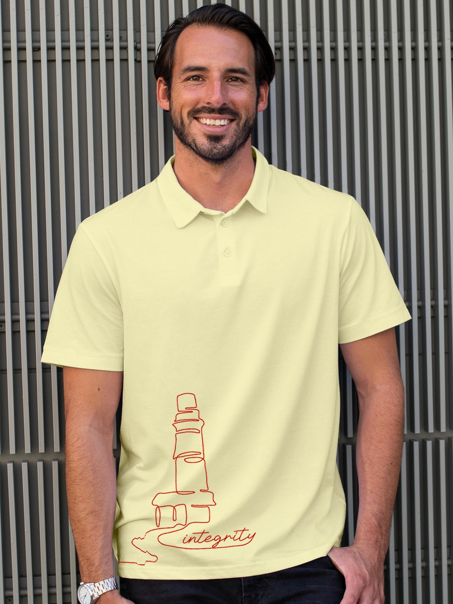 Model wearing Men's Yellow Polo T-shirt with 'Integrity' design, offering effortless style and premium comfort