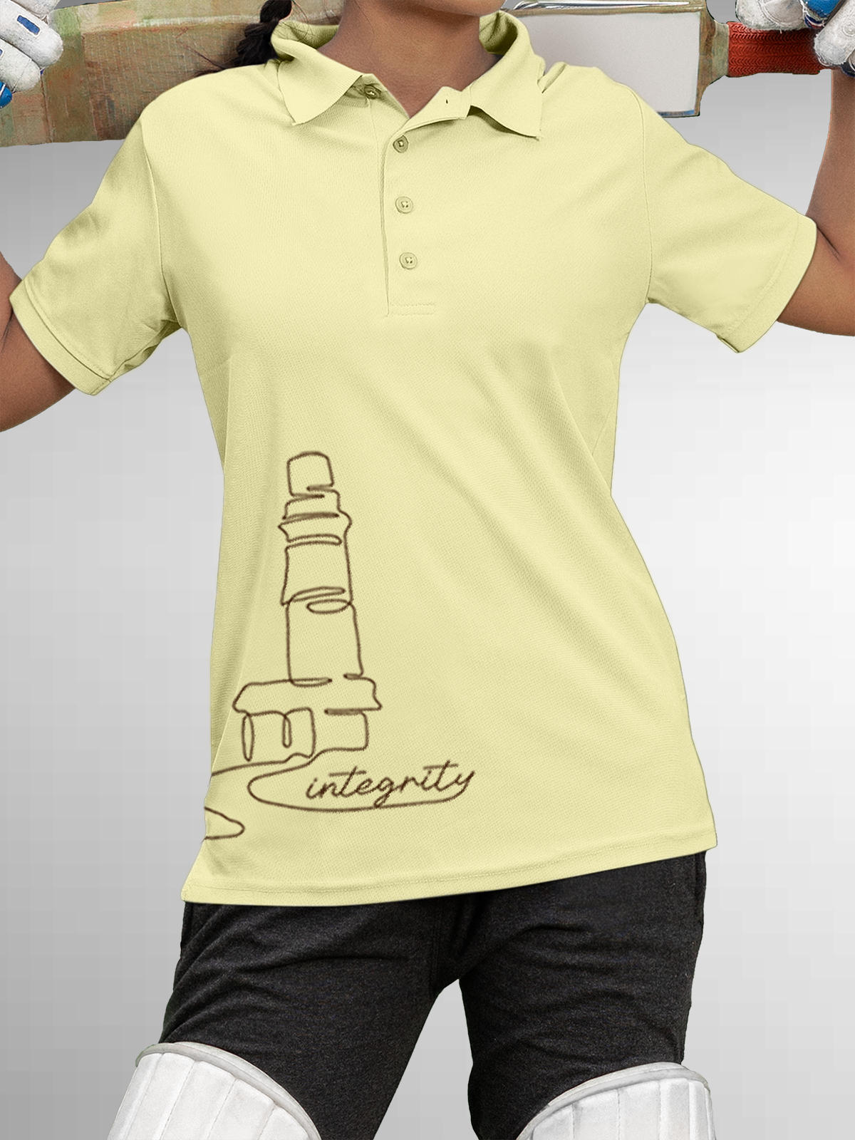 Model wearing Women's Yellow Polo T-shirt with 'Integrity' design, offering effortless style and premium comfort
