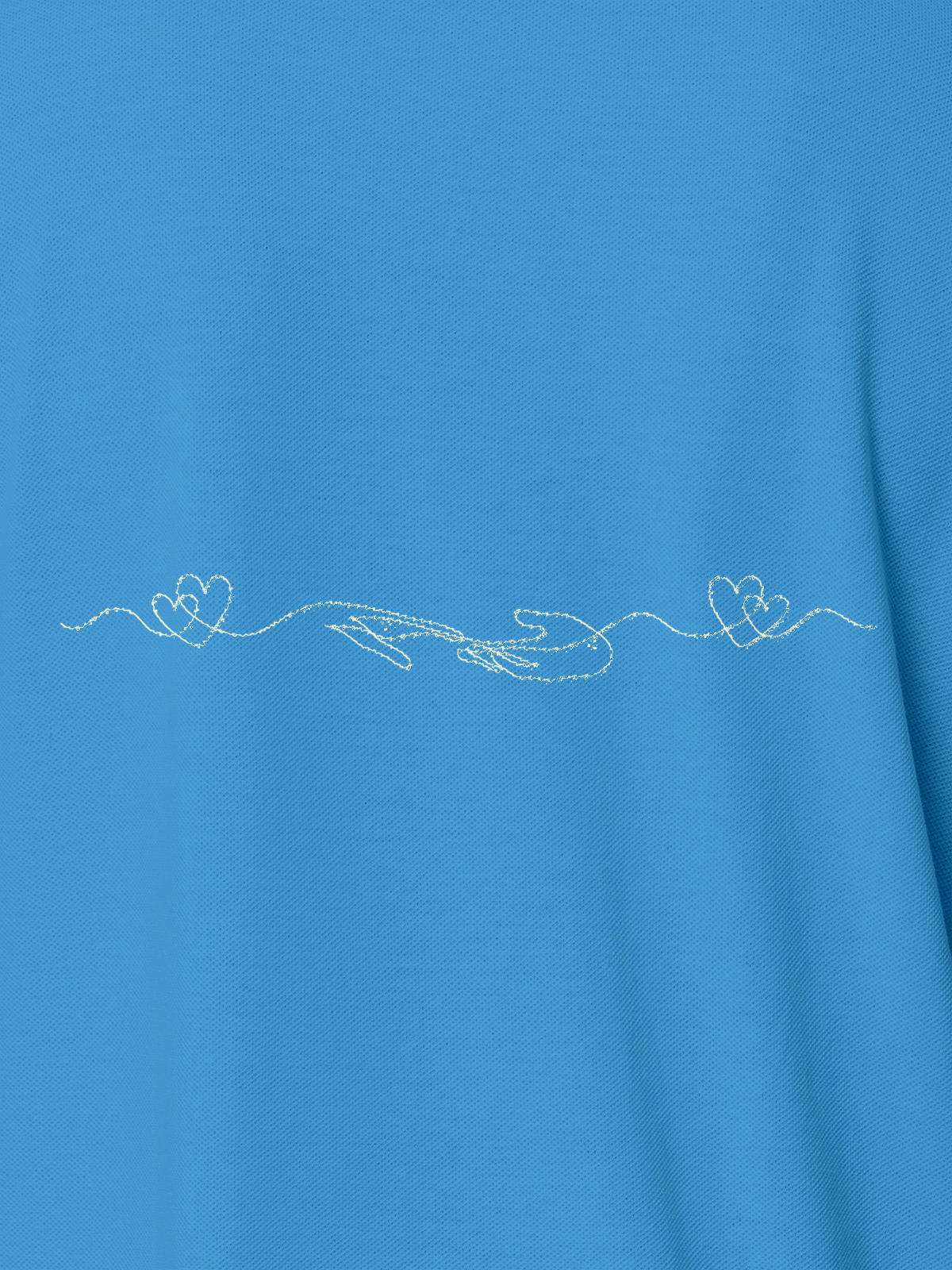 Close up of 'Empathy' design on Men's Blue Polo T-shirt, highlighting intricate details and vibrant print.
