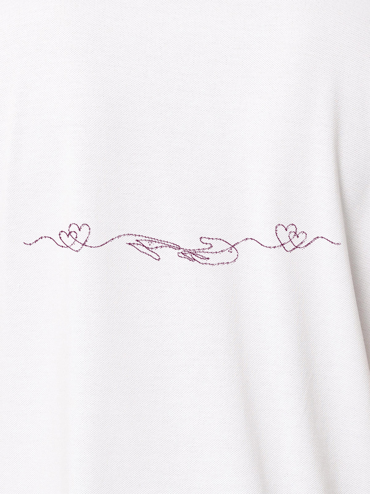 Close up of 'Empathy' design on Men's White Polo T-shirt, highlighting intricate details and vibrant print.