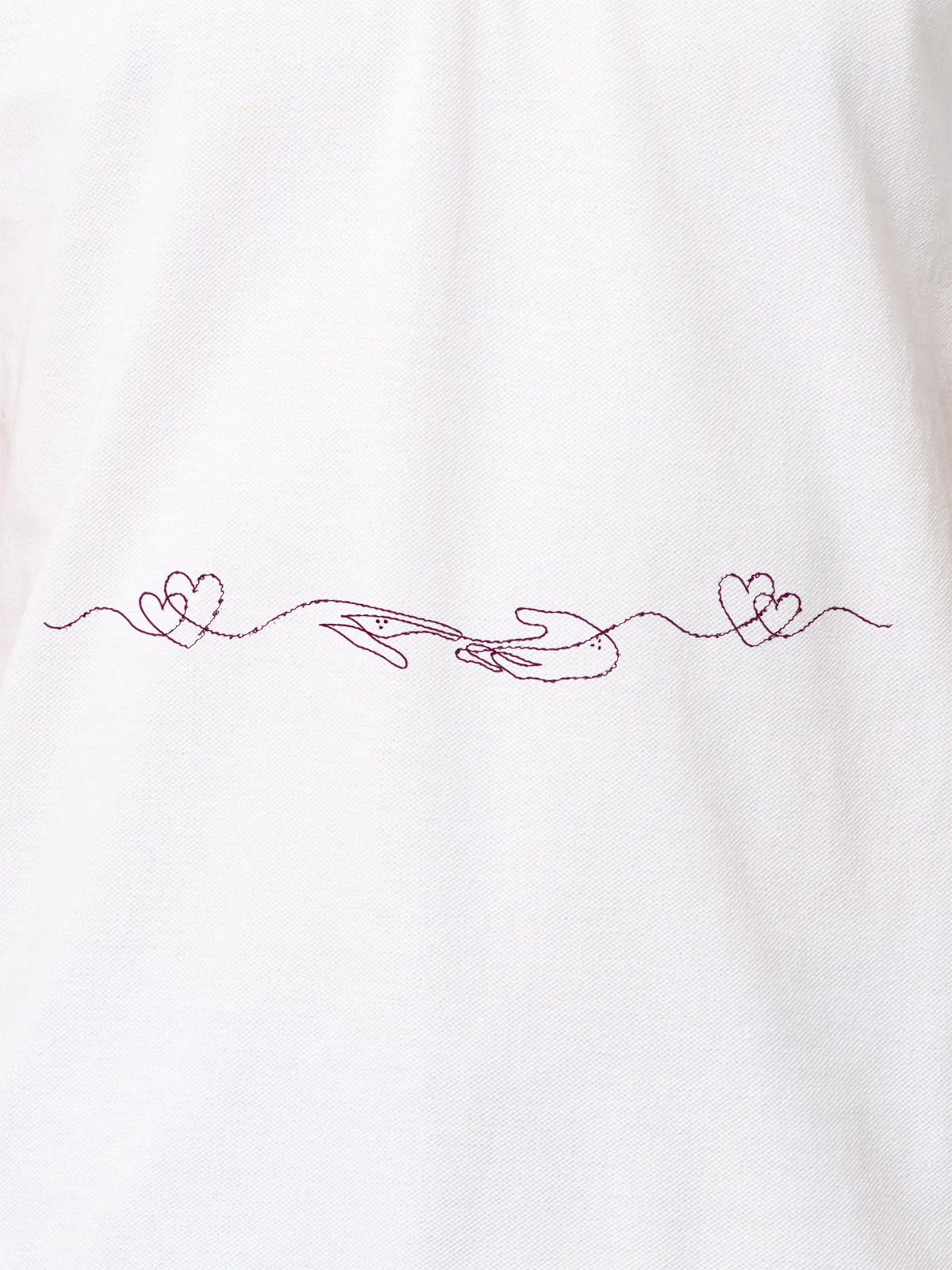 Close up of 'Empathy' design on Women's White Polo T-shirt, highlighting intricate details and vibrant print.