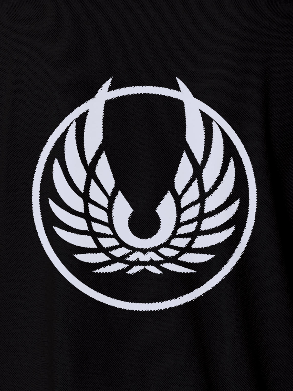 Close up of 'Free' design on Women's Black Polo T-shirt, highlighting intricate details and vibrant print.