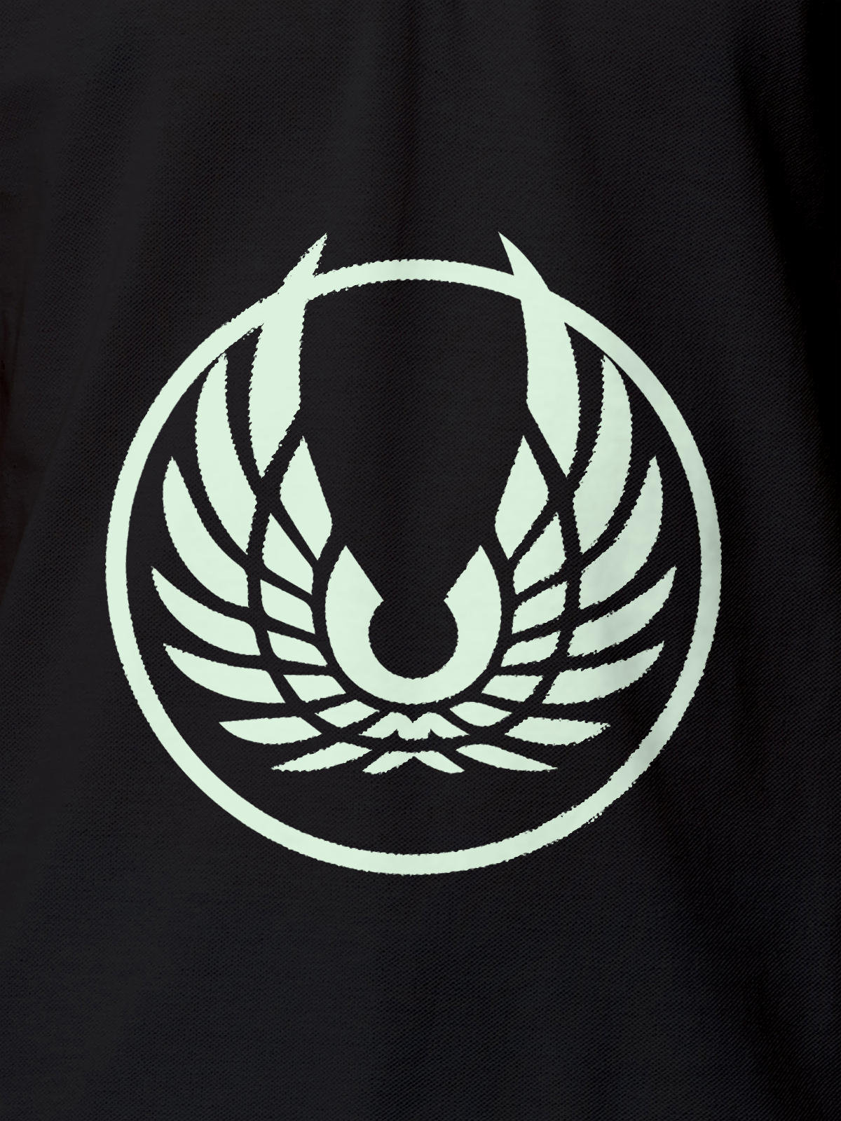 Close up of 'Free' design on Men's Dark Grey Polo T-shirt, highlighting intricate details and vibrant print.