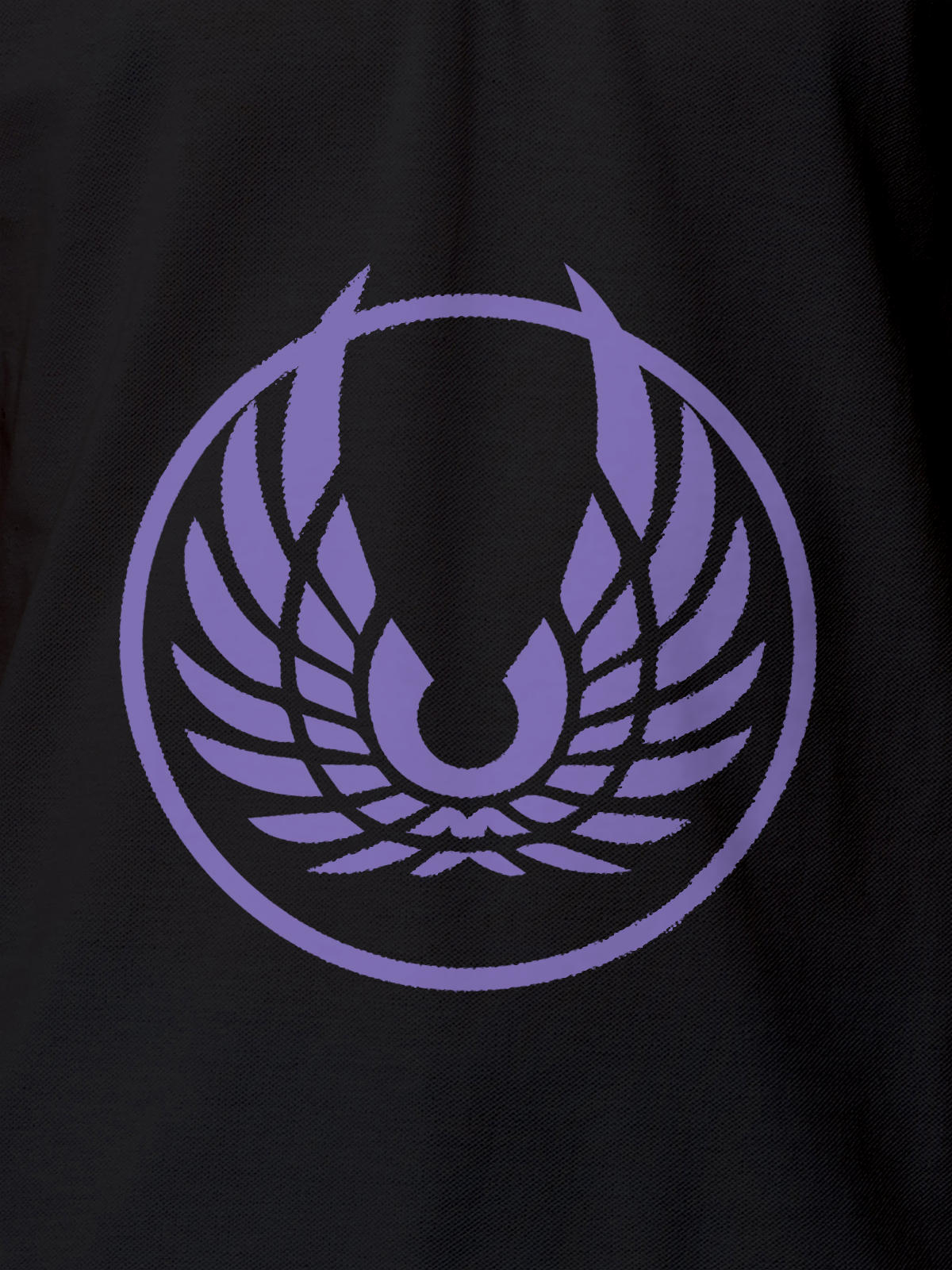 Close up of 'Free' design on Men's Dark Grey Polo T-shirt, highlighting intricate details and vibrant print.