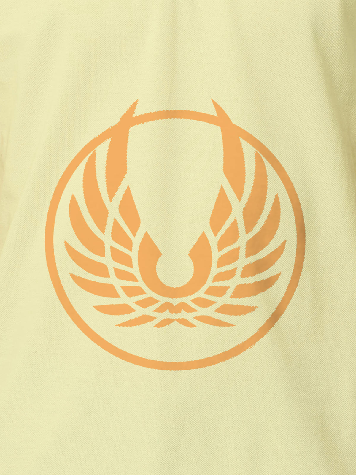 Close up of 'Free' design on Men's Yellow Polo T-shirt, highlighting intricate details and vibrant print.