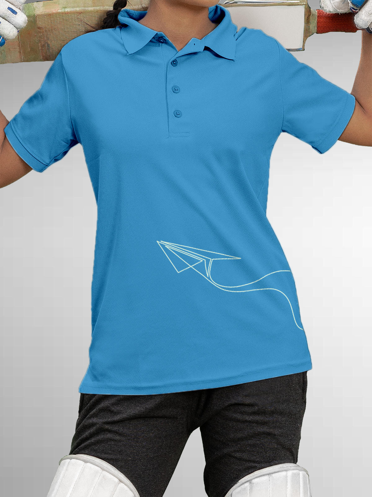 Model wearing Women's Blue Polo T-shirt with 'Empowered' design, offering effortless style and premium comfort