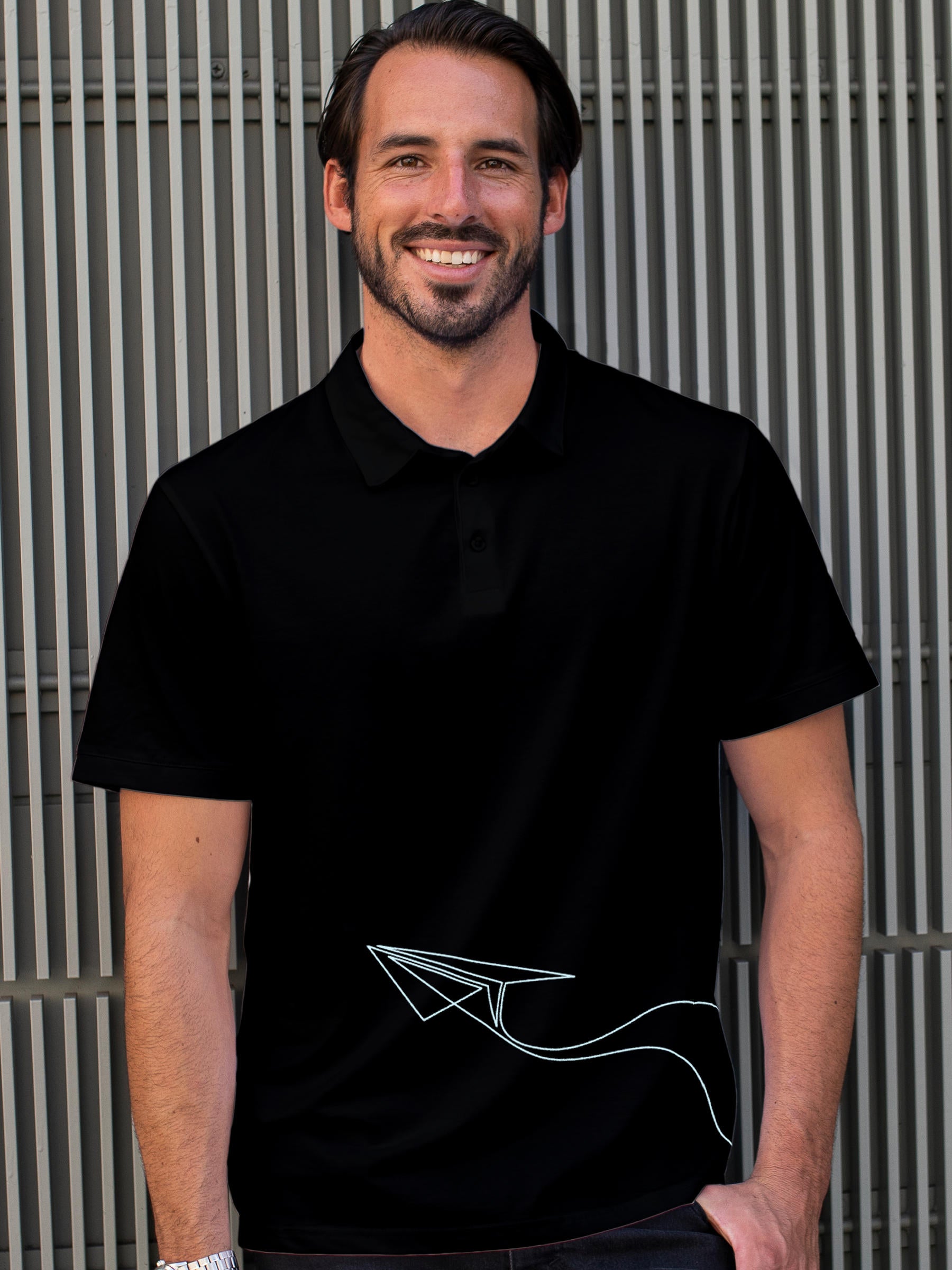 Model wearing Men's Black Polo T-shirt with 'Empowered' design, offering effortless style and premium comfort