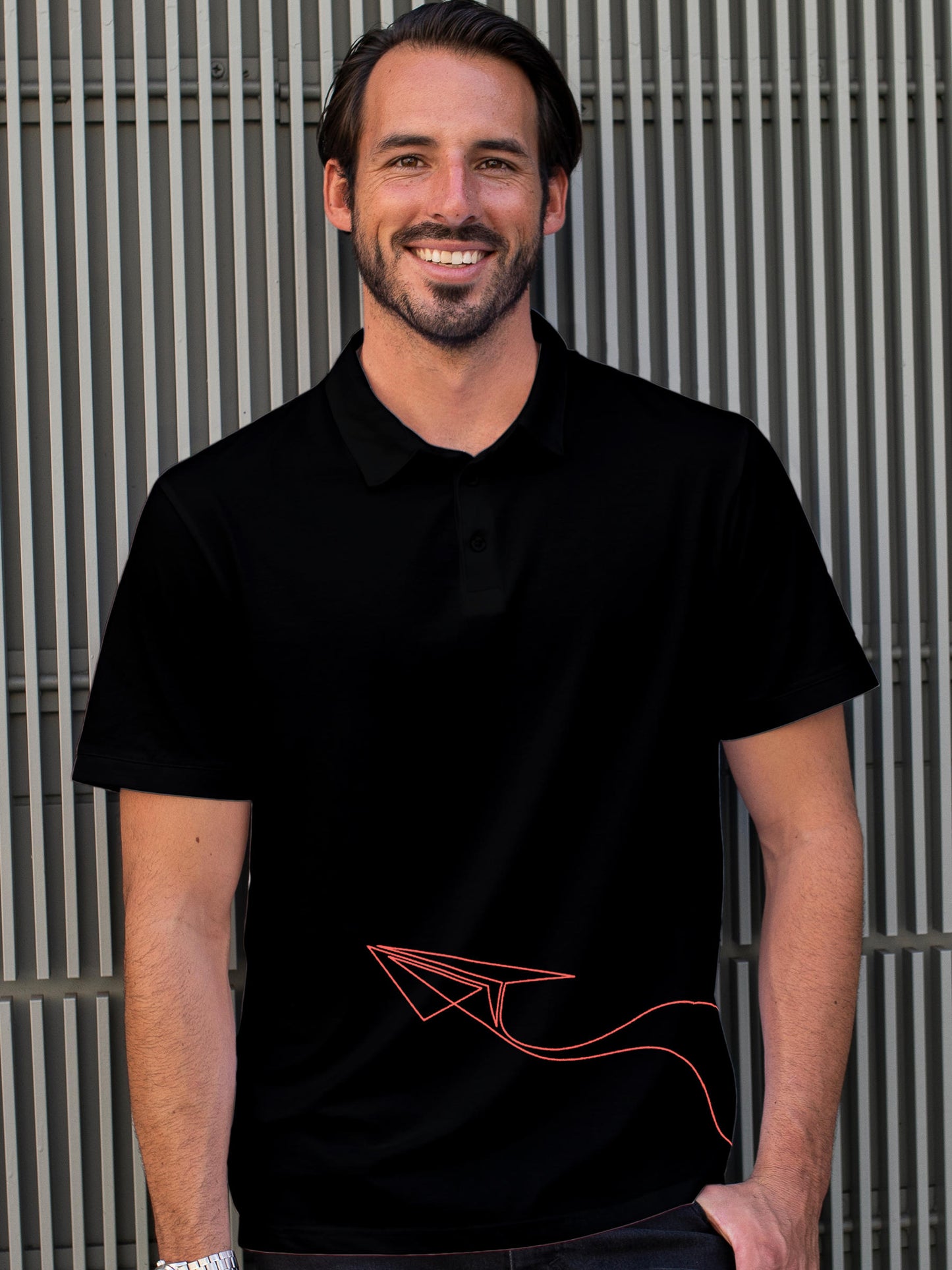 Model wearing Men's Black Polo T-shirt with 'Empowered' design, offering effortless style and premium comfort
