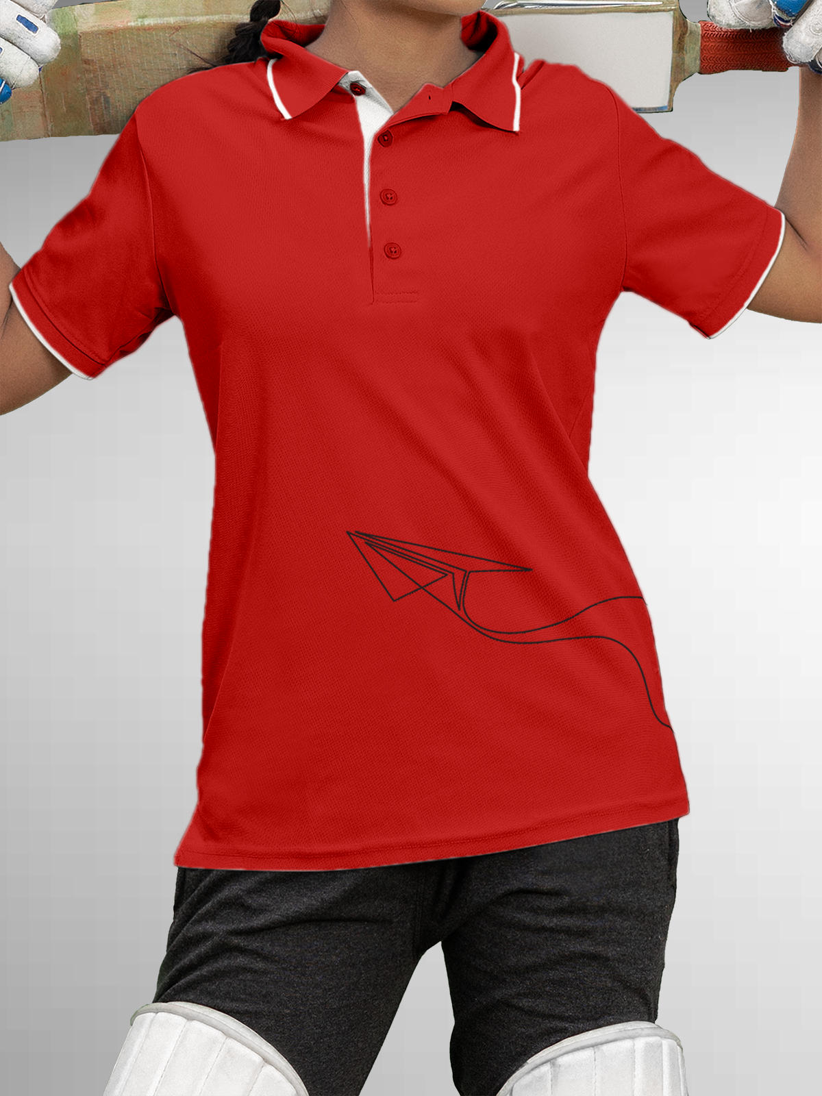 Model wearing Women's Red Polo T-shirt with 'Empowered' design, offering effortless style and premium comfort