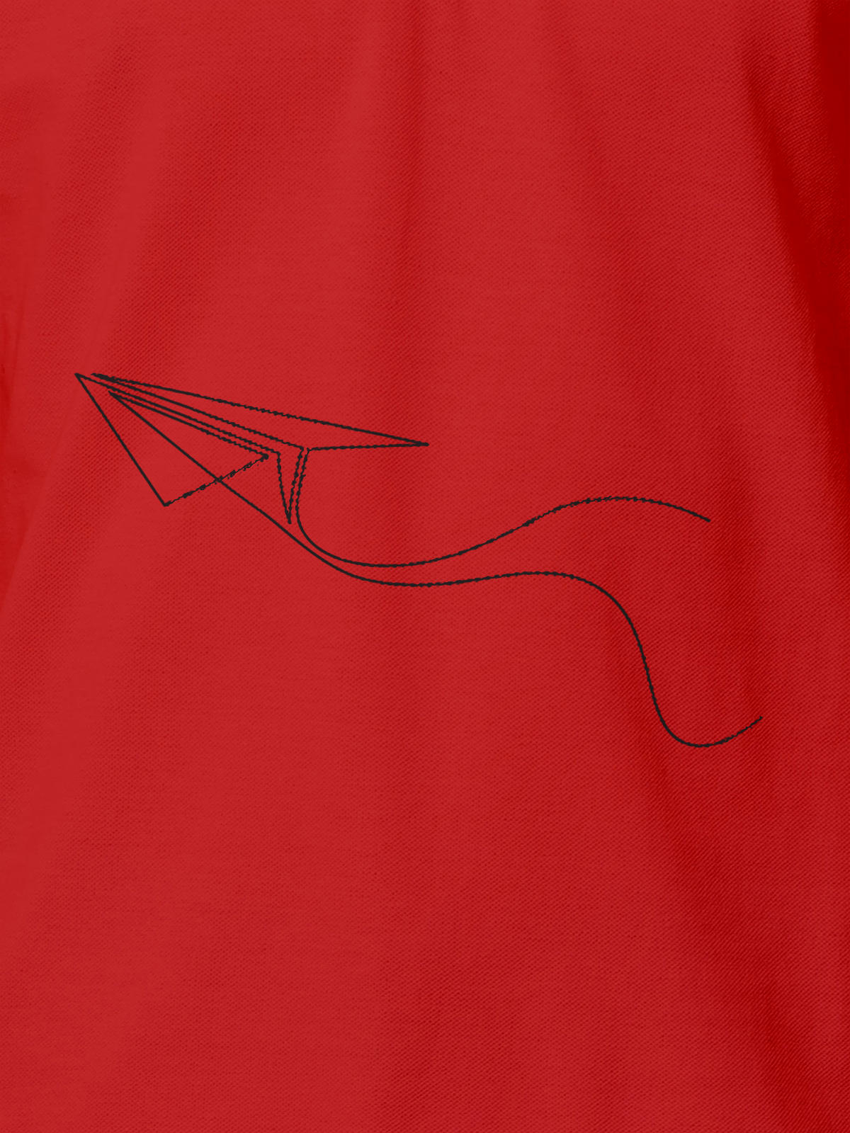 Close up of 'Empowered' design on Women's Red Polo T-shirt, highlighting intricate details and vibrant print.