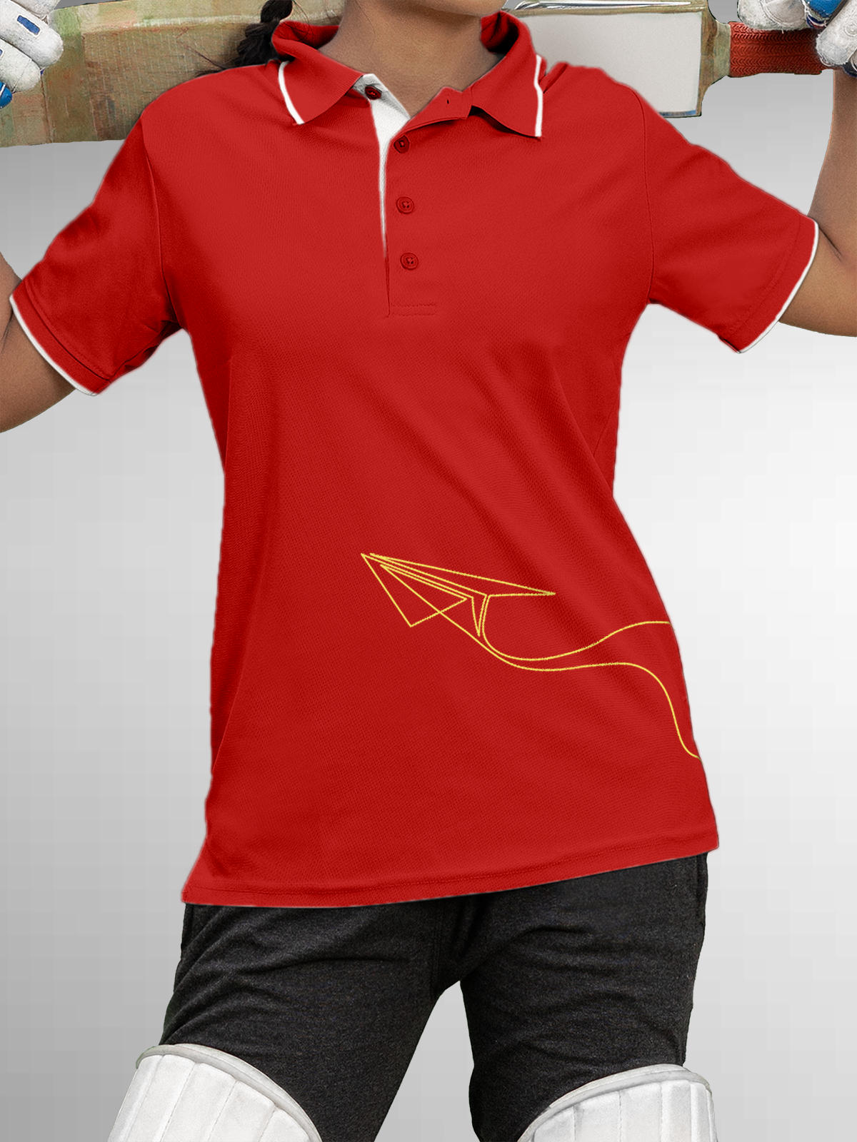 Model wearing Women's Red Polo T-shirt with 'Empowered' design, offering effortless style and premium comfort