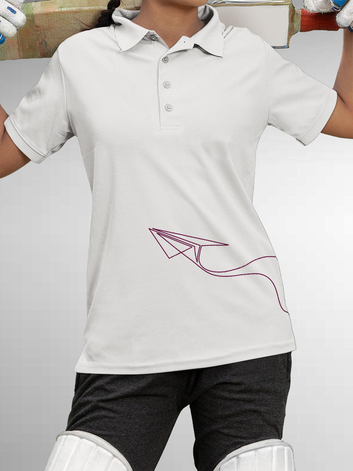 Model wearing Women's White Polo T-shirt with 'Empowered' design, offering effortless style and premium comfort