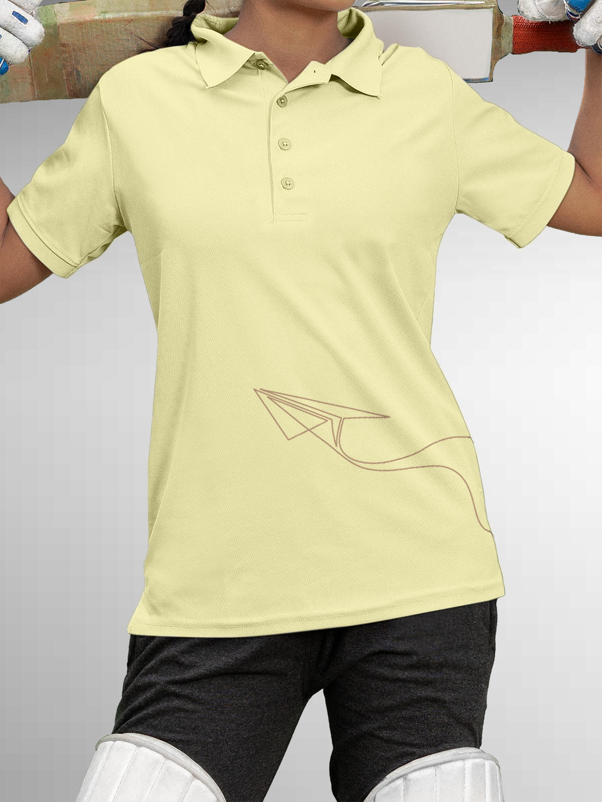 Model wearing Women's Yellow Polo T-shirt with 'Empowered' design, offering effortless style and premium comfort