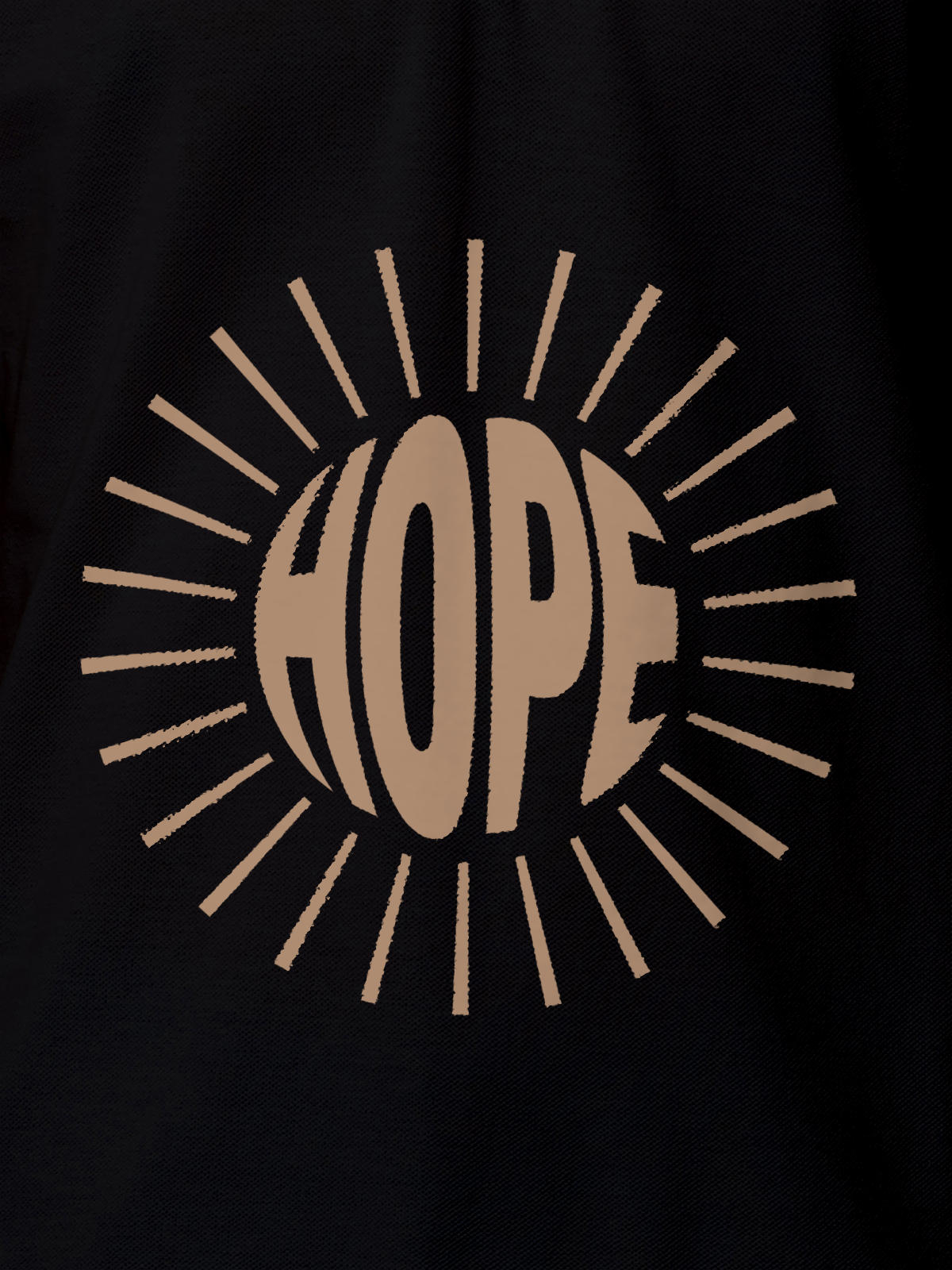Close up of 'Hope' design on Men's Black Polo T-shirt, highlighting intricate details and vibrant print.