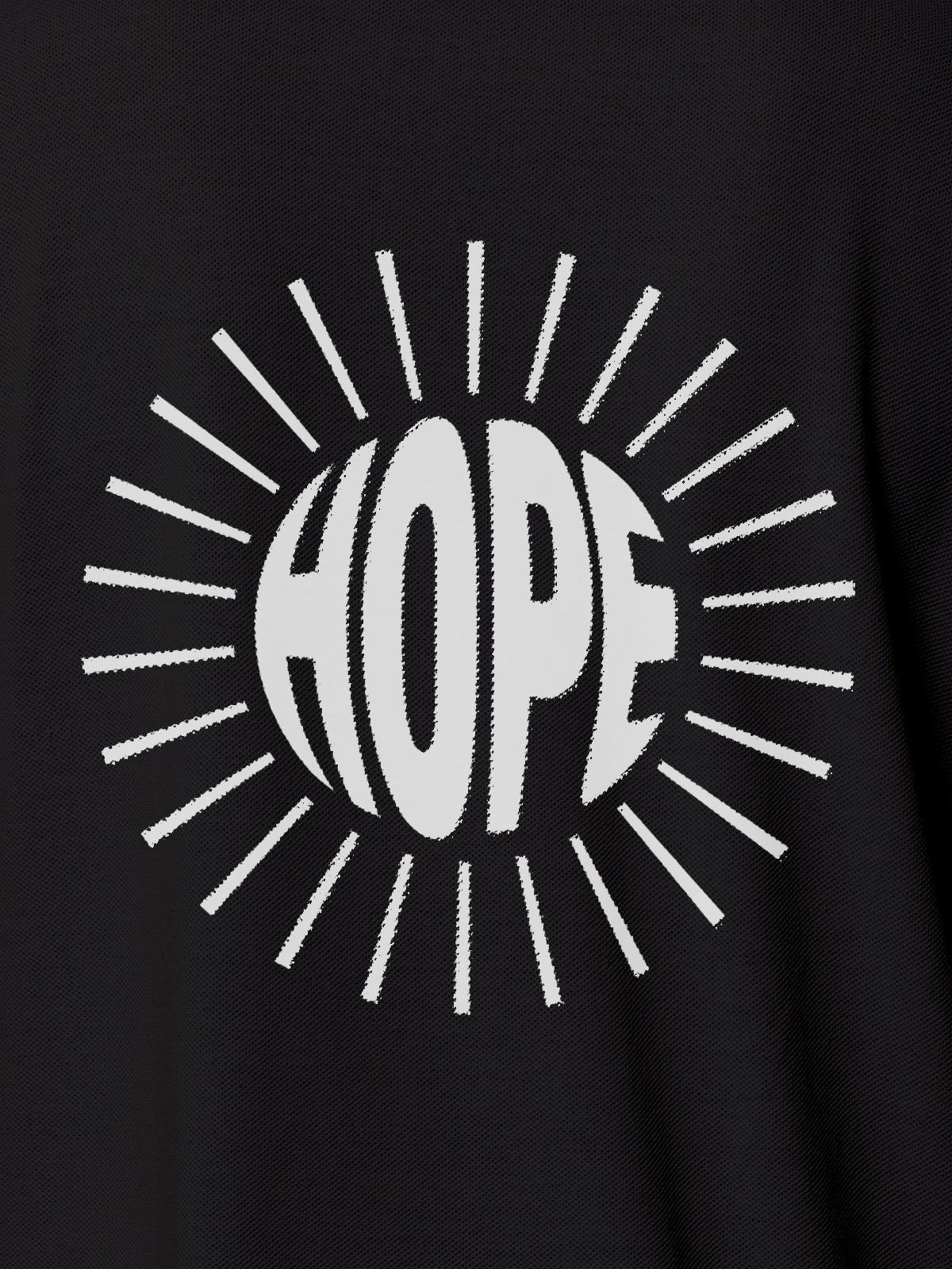 Close up of 'Hope' design on Women's Dark Grey Polo T-shirt, highlighting intricate details and vibrant print.
