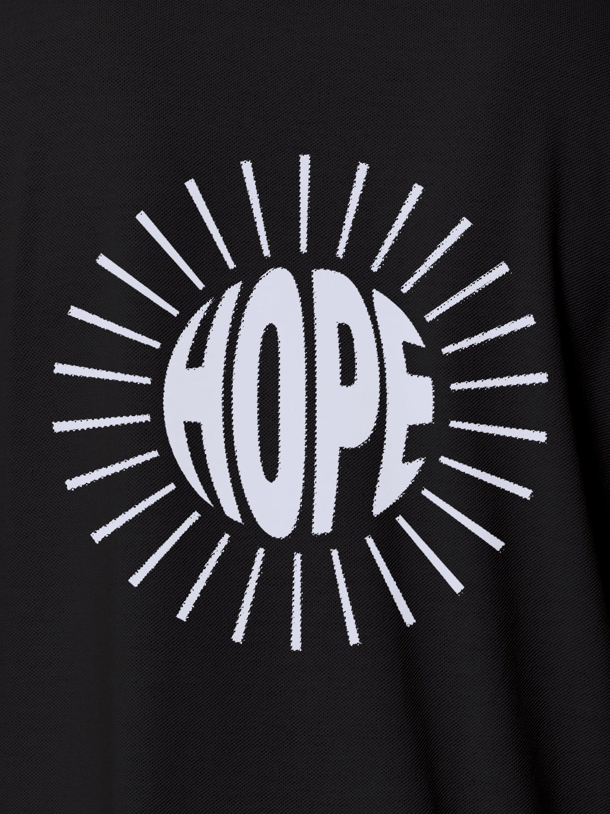 Close up of 'Hope' design on Women's Dark Grey Polo T-shirt, highlighting intricate details and vibrant print.
