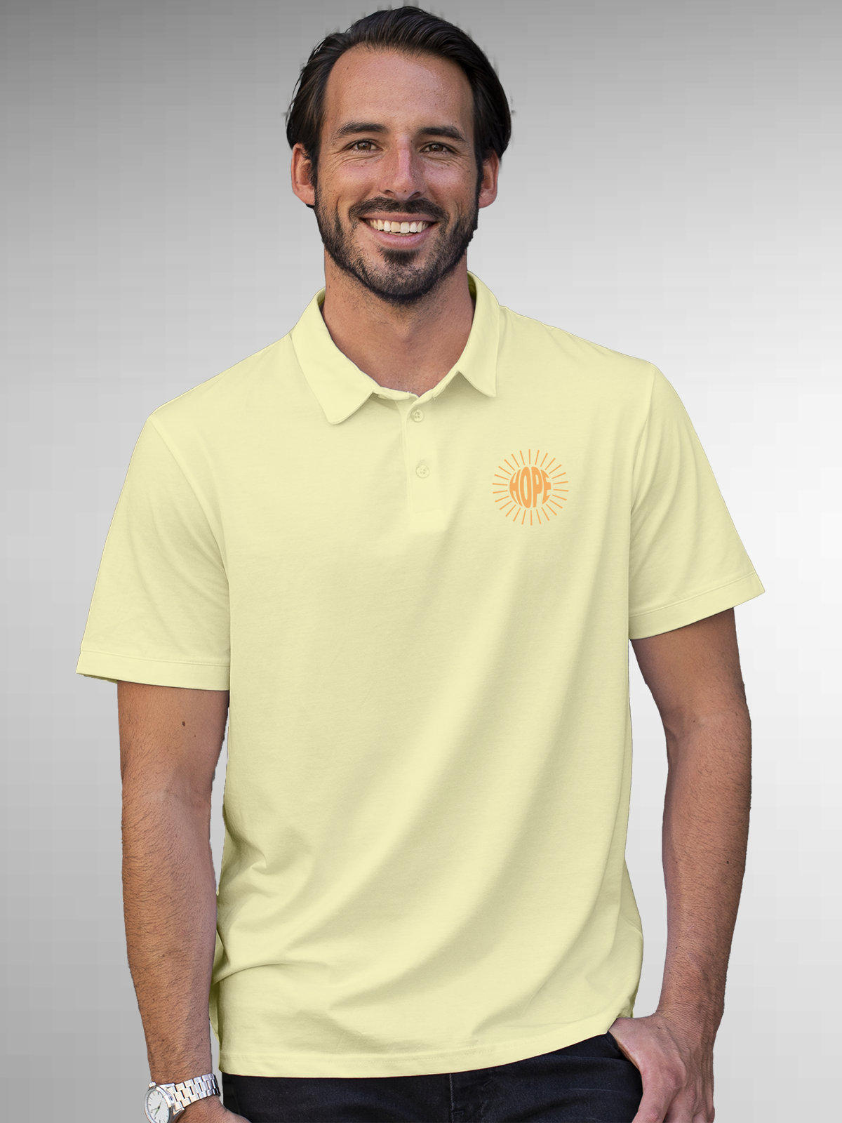 Model wearing Men's Yellow Polo T-shirt with 'Hope' design, offering effortless style and premium comfort
