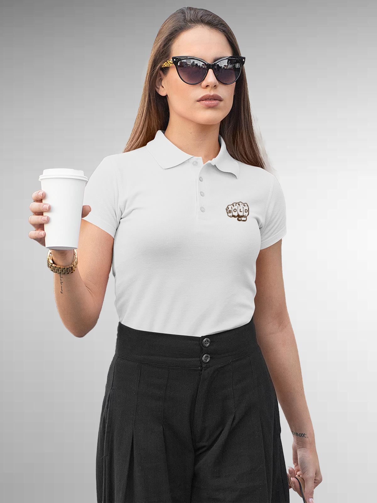 Model wearing Women's White Polo T-shirt with 'Bold' design, offering effortless style and premium comfort