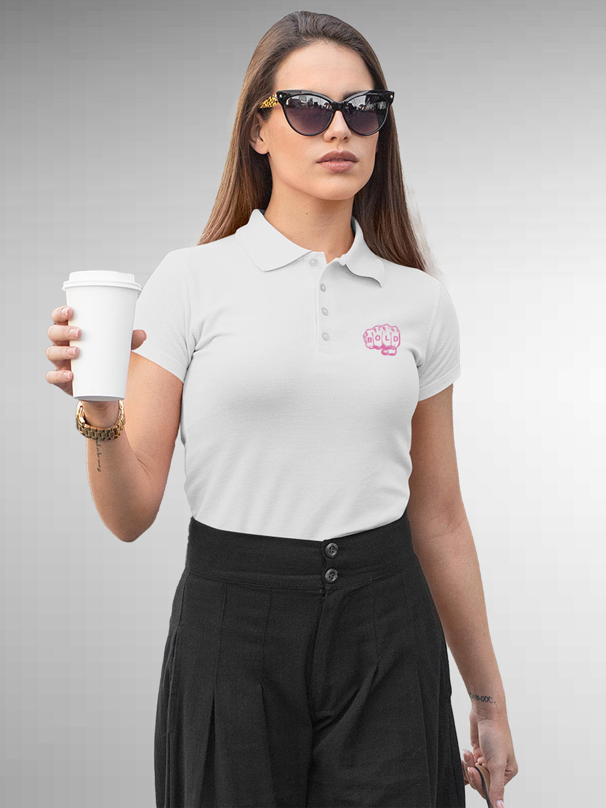 Model wearing Women's White Polo T-shirt with 'Bold' design, offering effortless style and premium comfort