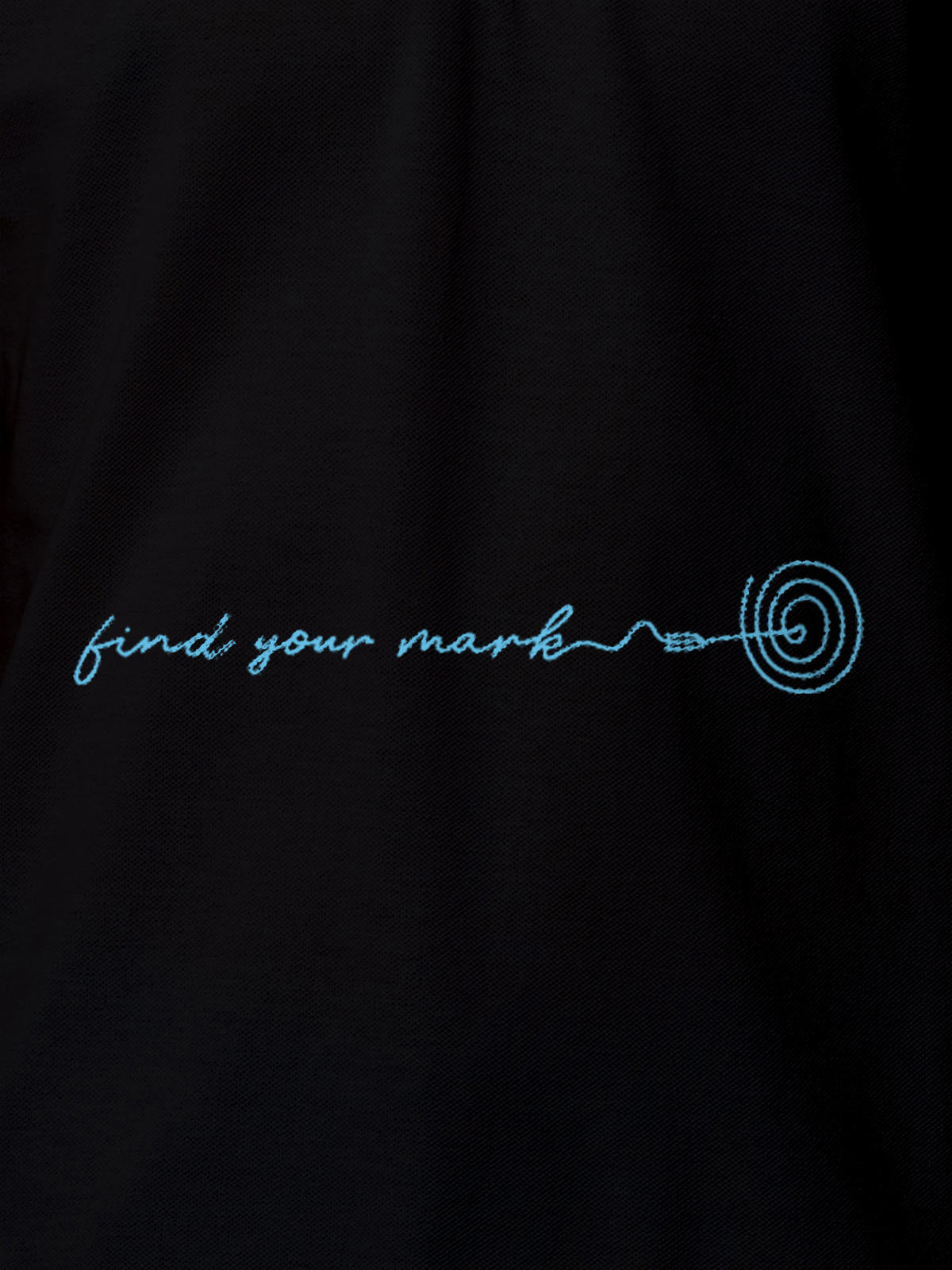 Close up of 'Find Your Mark' design on Men's Black Polo T-shirt, highlighting intricate details and vibrant print.