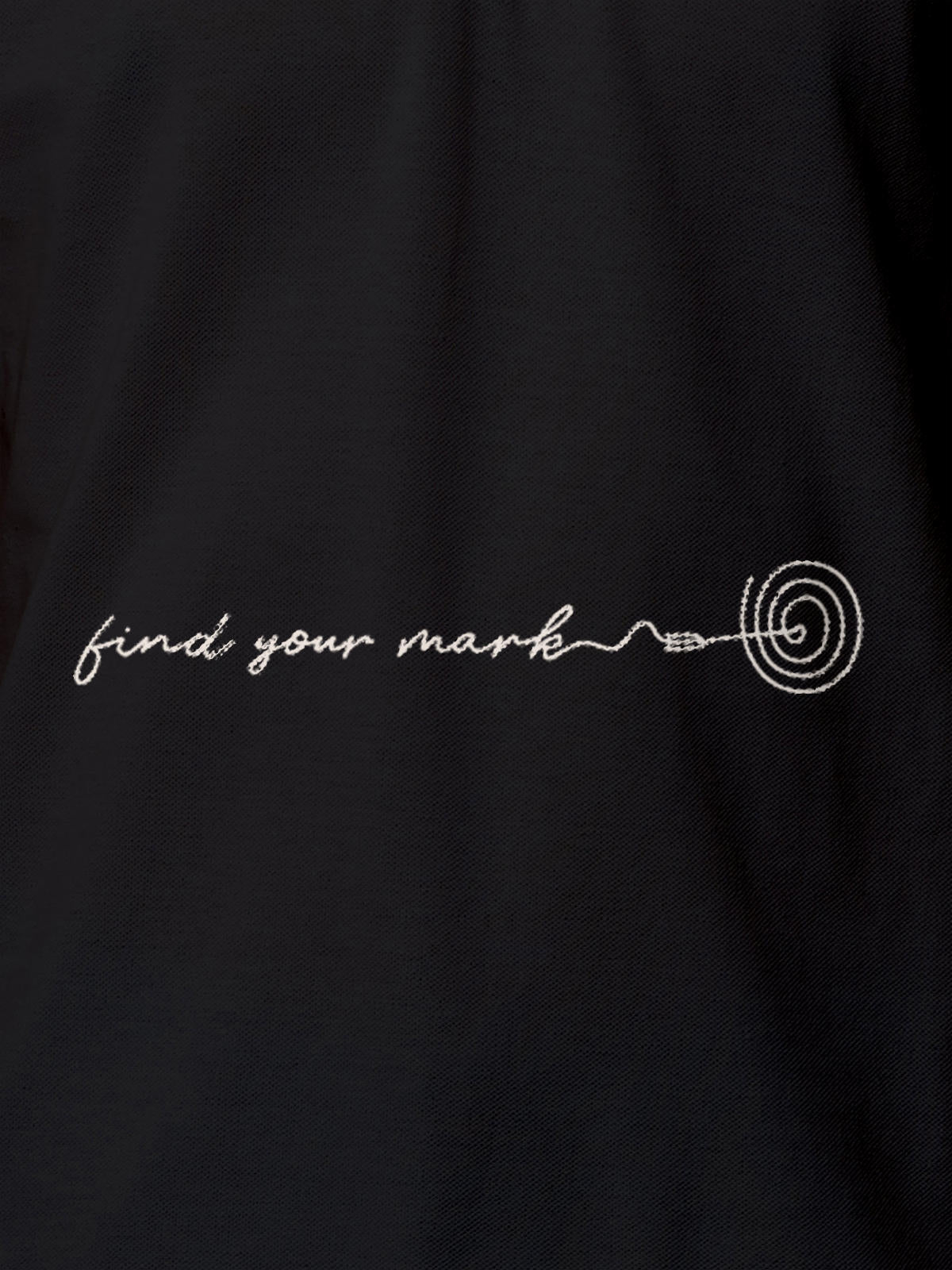 Close up of 'Find Your Mark' design on Men's Dark Grey Polo T-shirt, highlighting intricate details and vibrant print.