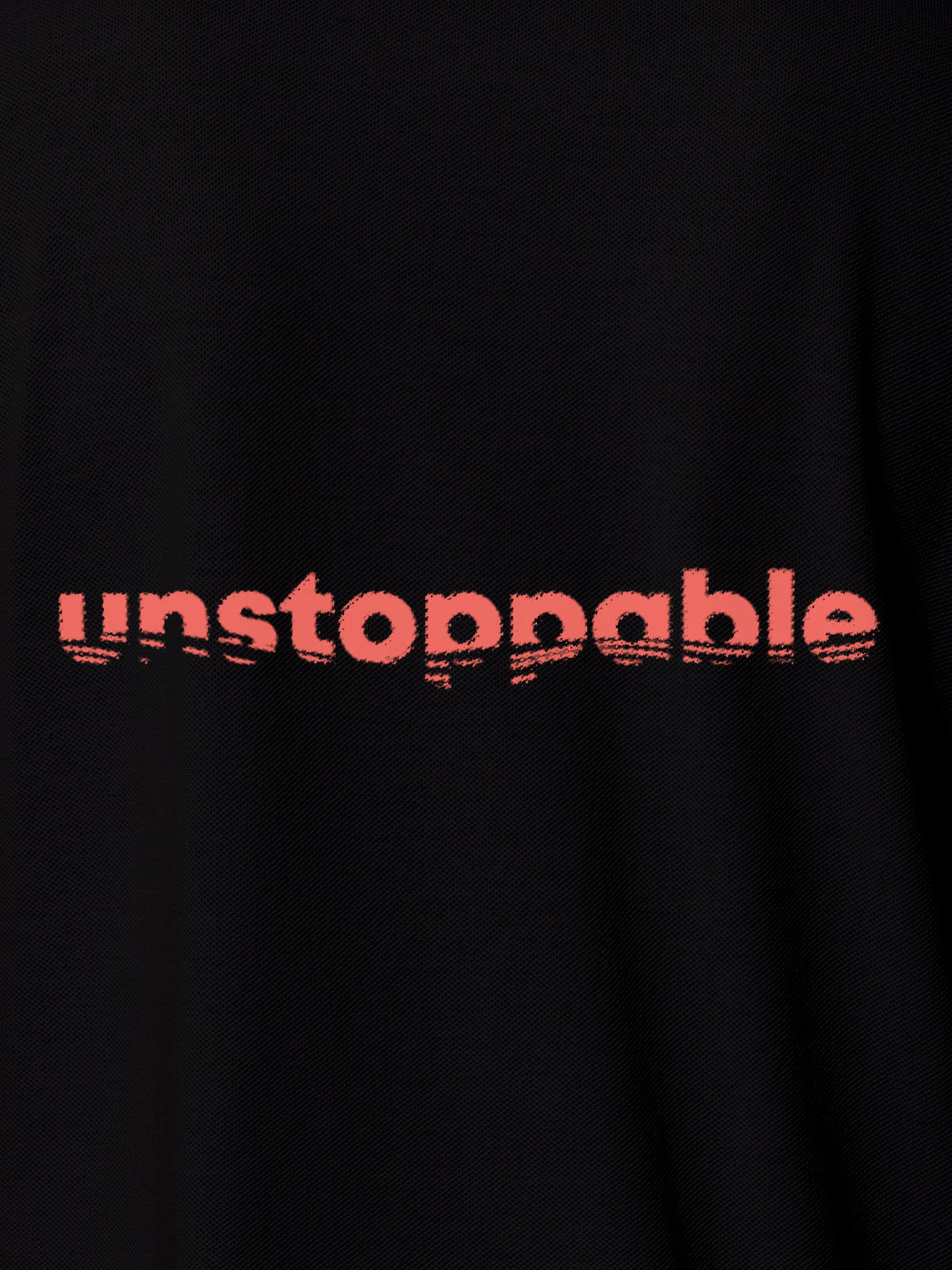 Close up of 'Unstoppable' design on Men's Black Polo T-shirt, highlighting intricate details and vibrant print.