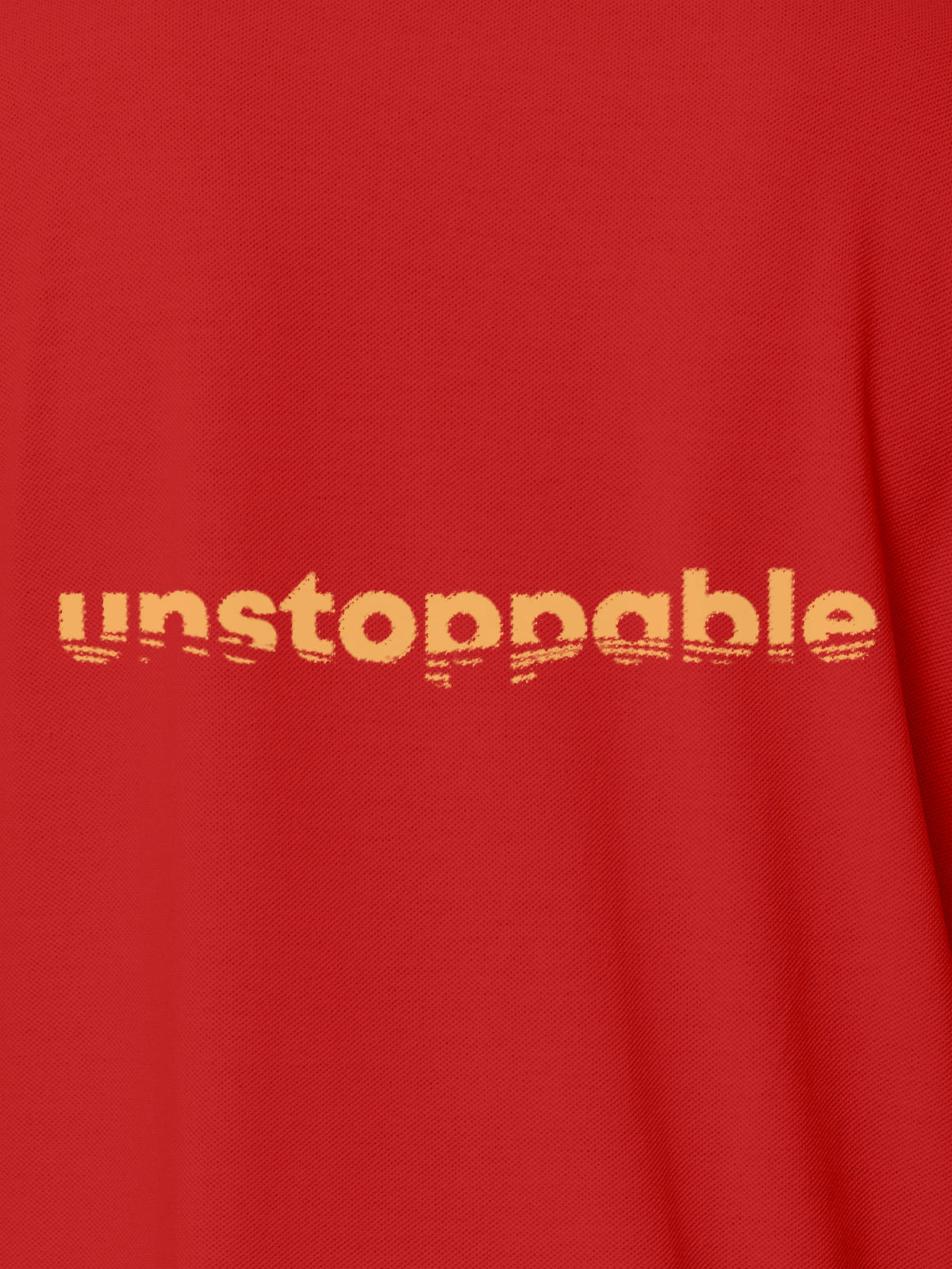 Close up of 'Unstoppable' design on Men's Red Polo T-shirt, highlighting intricate details and vibrant print.