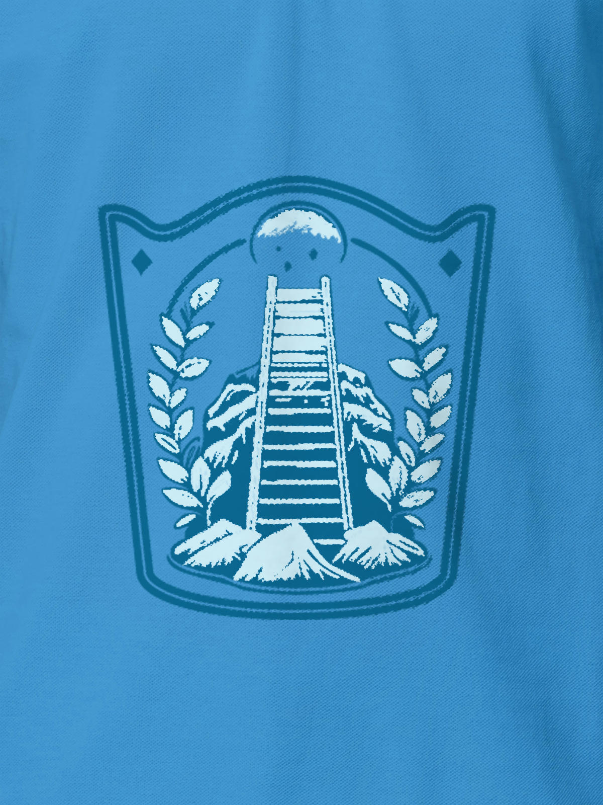 Close up of 'Ambition' design on Men's Blue Polo T-shirt, highlighting intricate details and vibrant print.