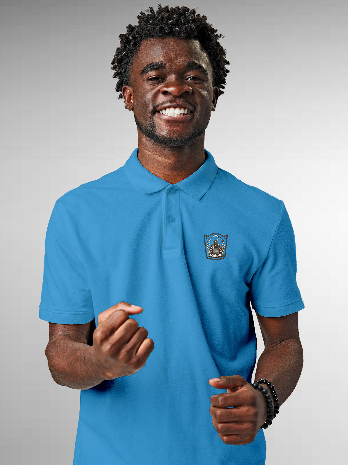 Model wearing Men's Blue Polo T-shirt with 'Ambition' design, offering effortless style and premium comfort