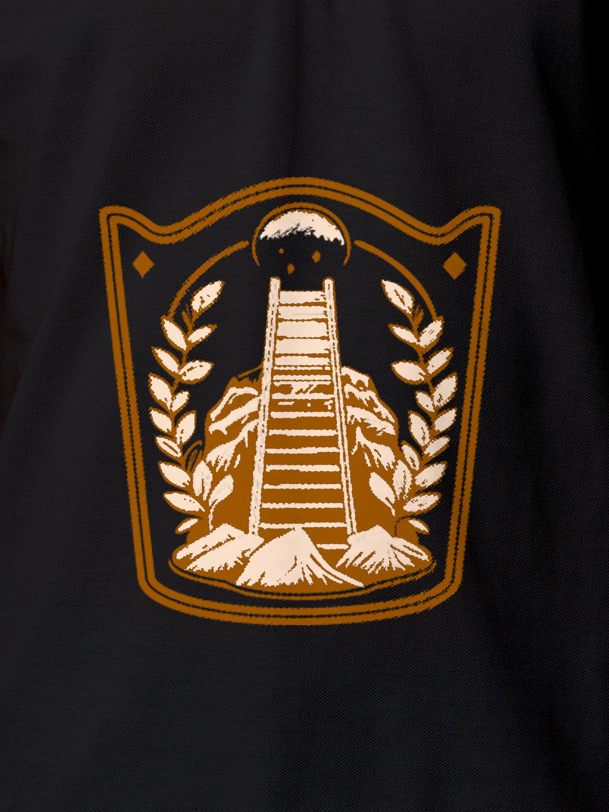 Close up of 'Ambition' design on Men's Dark Grey Polo T-shirt, highlighting intricate details and vibrant print.