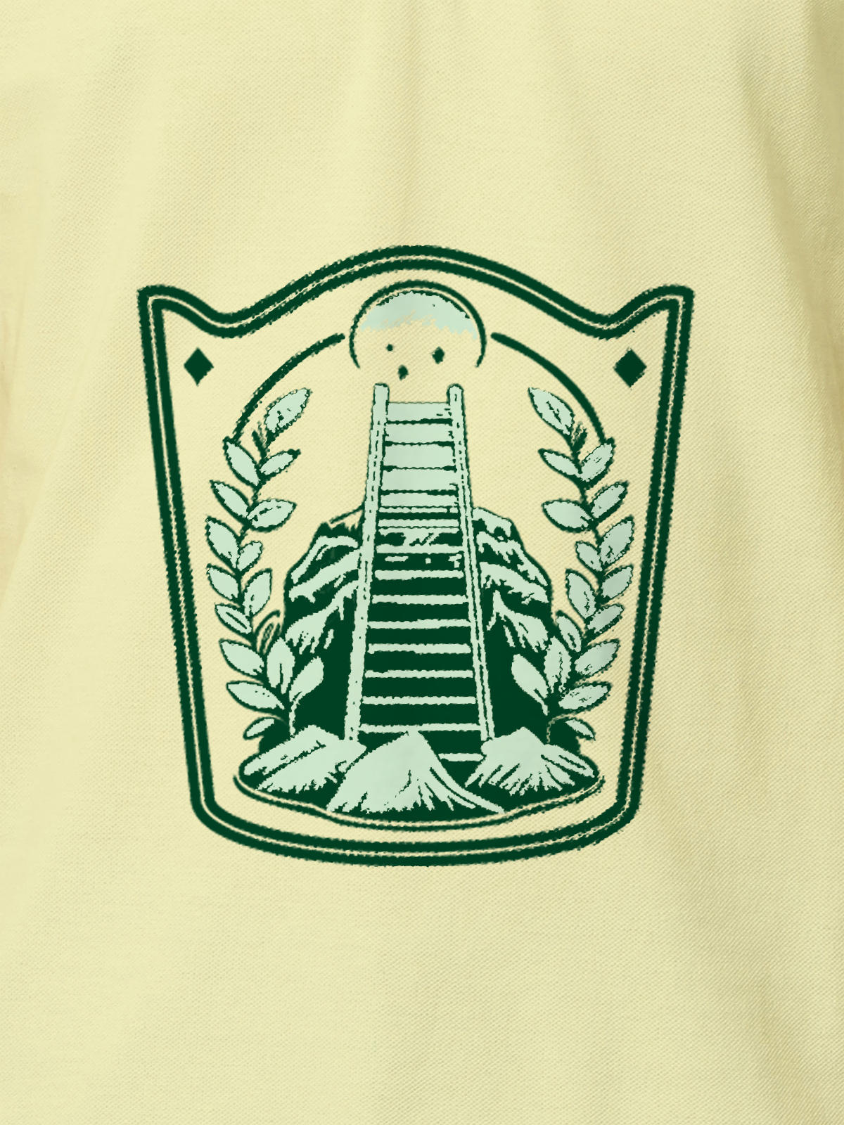 Close up of 'Ambition' design on Men's Yellow Polo T-shirt, highlighting intricate details and vibrant print.