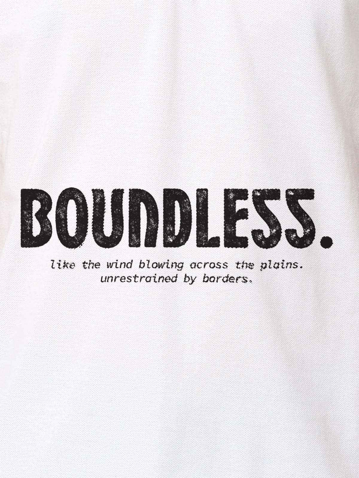 Close up of 'Free & Boundless' design on Men's White Polo T-shirt, highlighting intricate details and vibrant print.