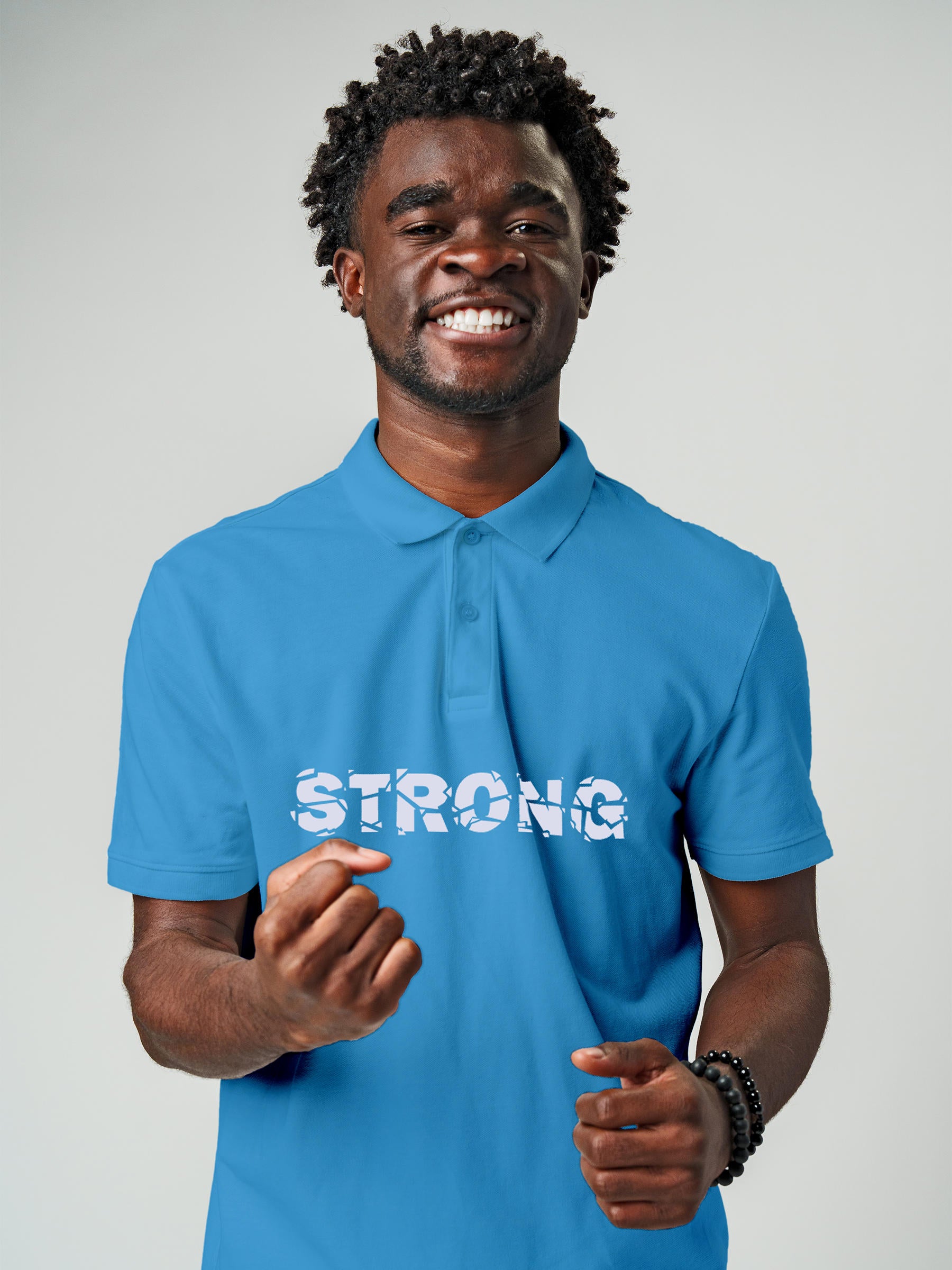 Model wearing Men's Blue Polo T-shirt with 'Strong' design, offering effortless style and premium comfort