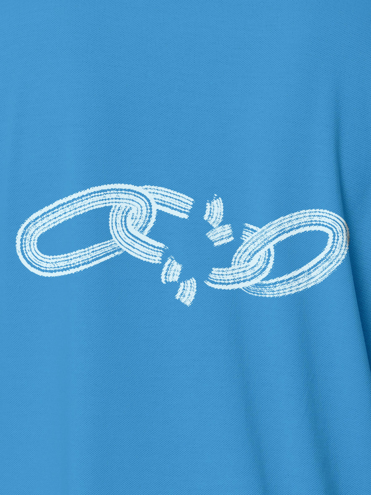 Close up of 'Boundless' design on Women's Blue Polo T-shirt, highlighting intricate details and vibrant print.