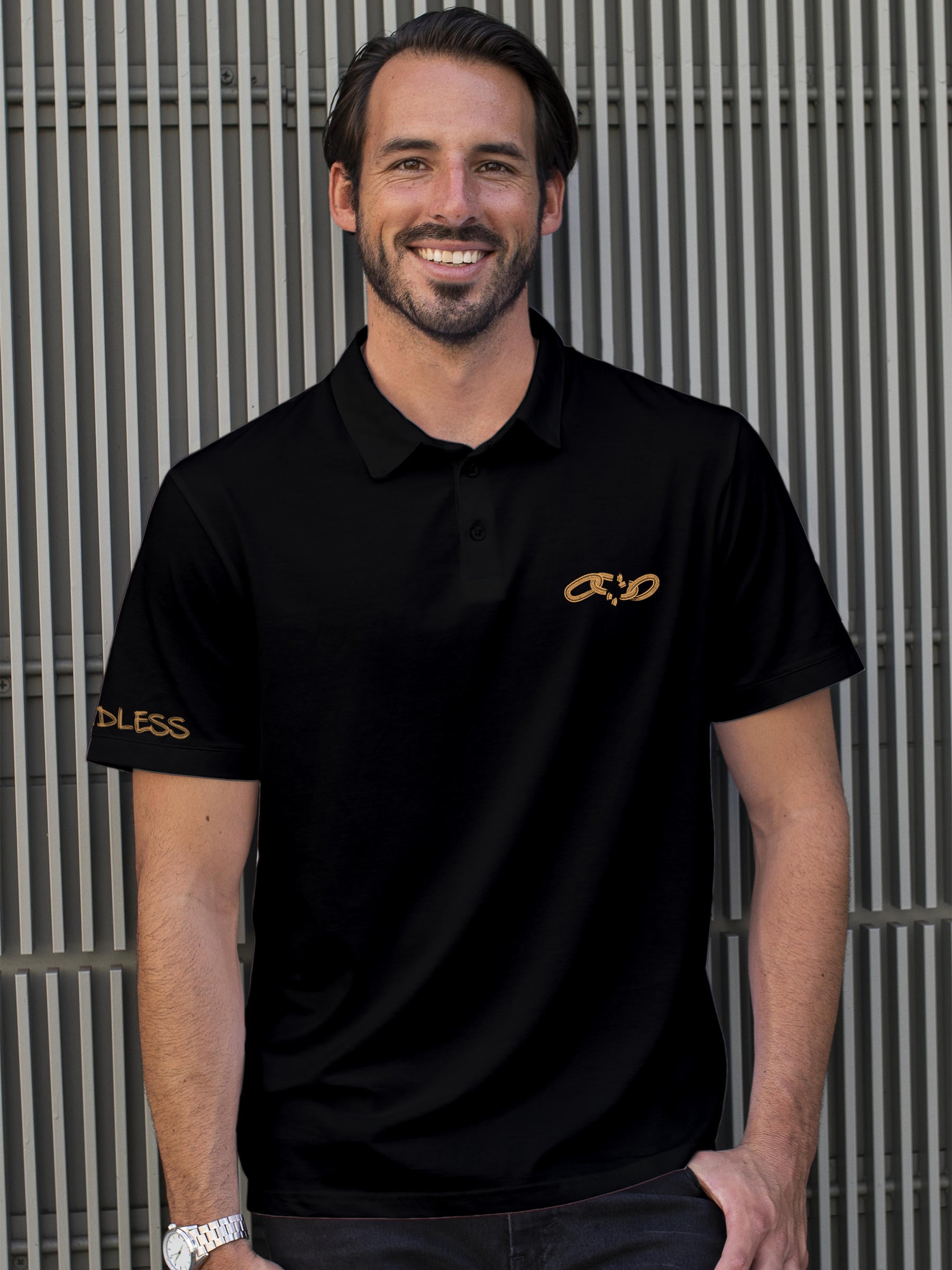 Model wearing Men's Black Polo T-shirt with 'Boundless' design, offering effortless style and premium comfort