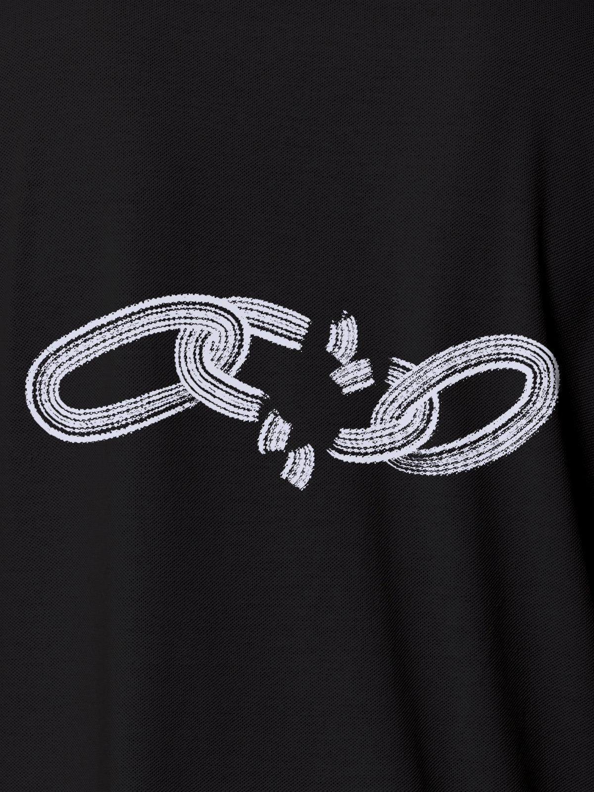 Close up of 'Boundless' design on Women's Dark Grey Polo T-shirt, highlighting intricate details and vibrant print.