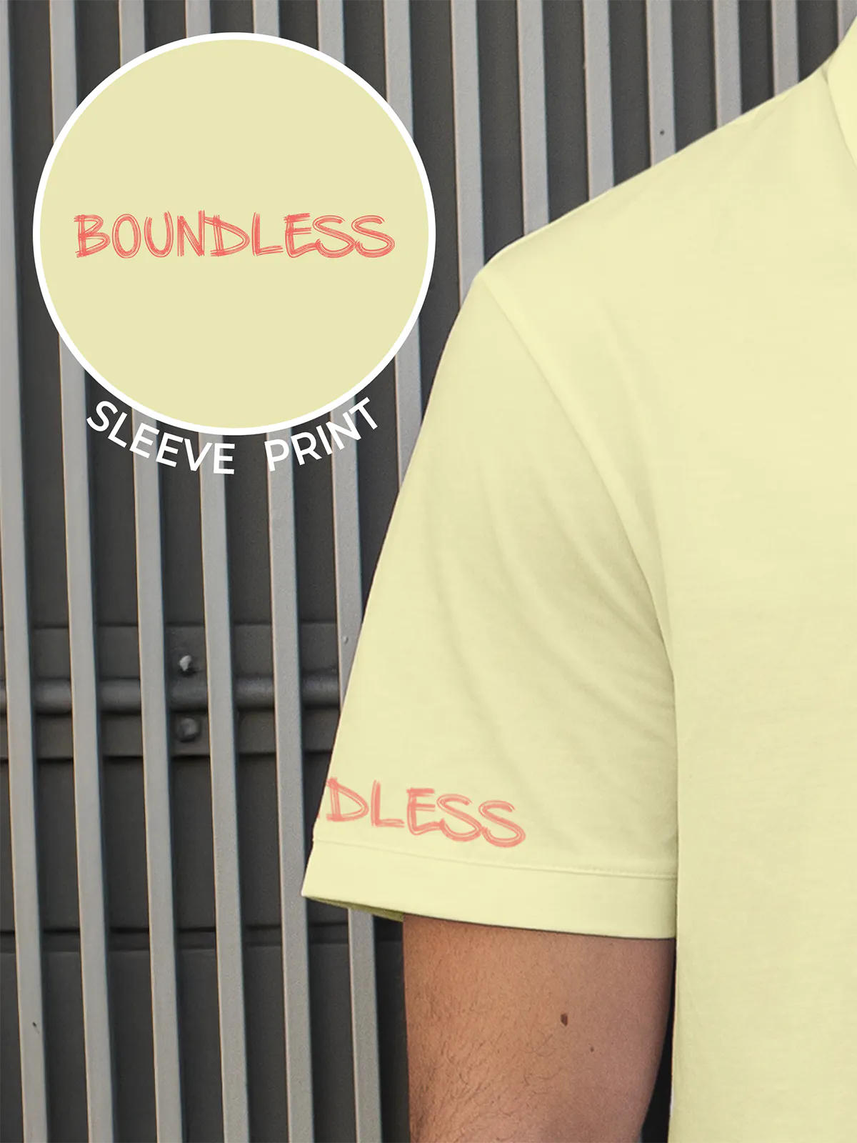 Close up of 'Boundless' print on the sleeve of Men's Yellow Collar T-shirt, highlighting the vibrant print.