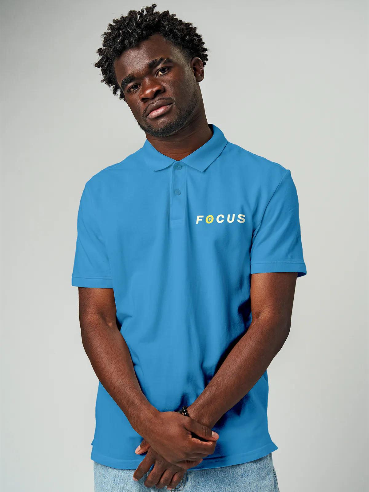 Close up of 'Focus' design on Men's Blue Collar T-shirt, highlighting intricate details and vibrant print.