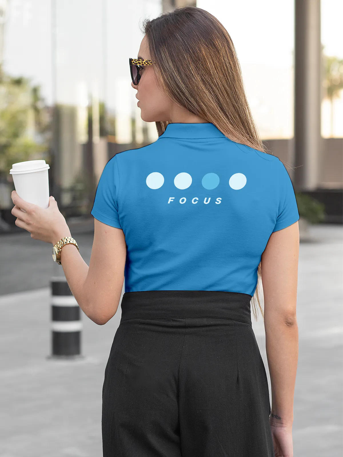 Model wearing Women's Blue Collar T-shirt with 'Focus' design printed at the back.