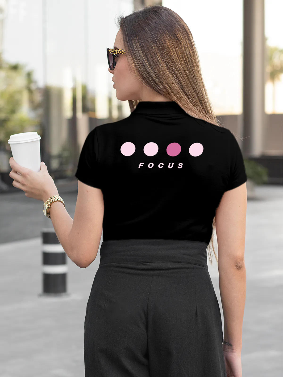 Model wearing Women's Black Collar T-shirt with 'Focus' design printed at the back.