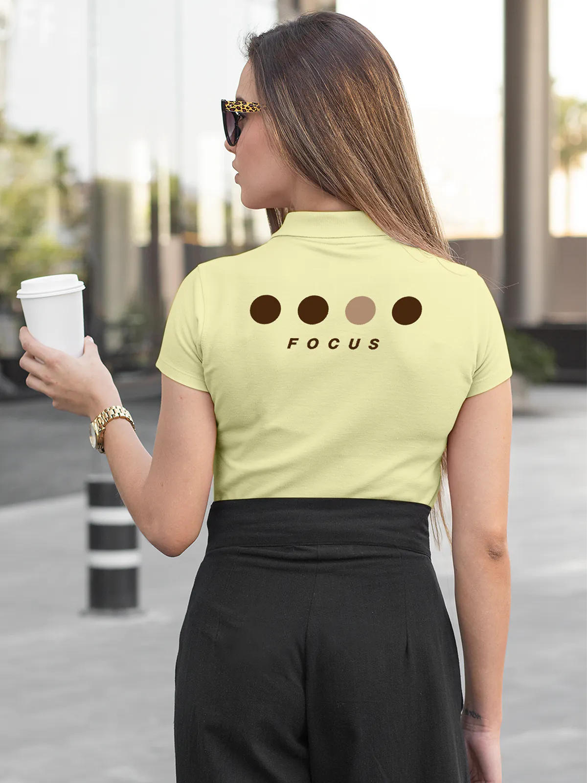 Model wearing Women's Yellow Collar T-shirt with 'Focus' design printed at the back.