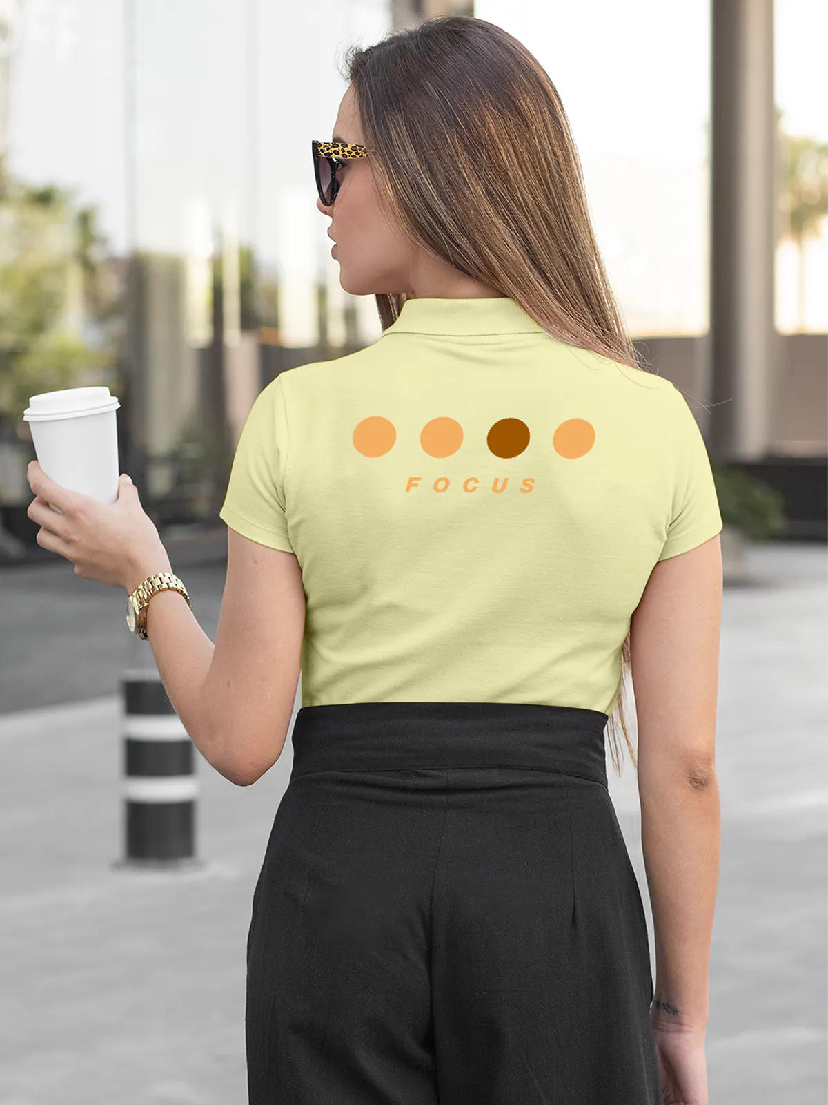 Model wearing Women's Yellow Collar T-shirt with 'Focus' design printed at the back.