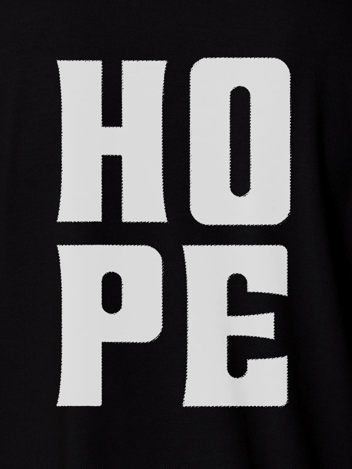 Close up of 'Hope' design on Men's Black Polo T-shirt, highlighting intricate details and vibrant print.