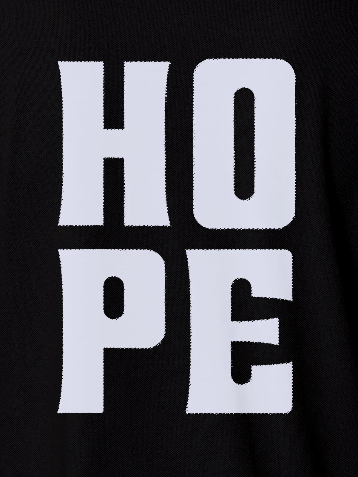 Close up of 'Hope' design on Men's Black Polo T-shirt, highlighting intricate details and vibrant print.