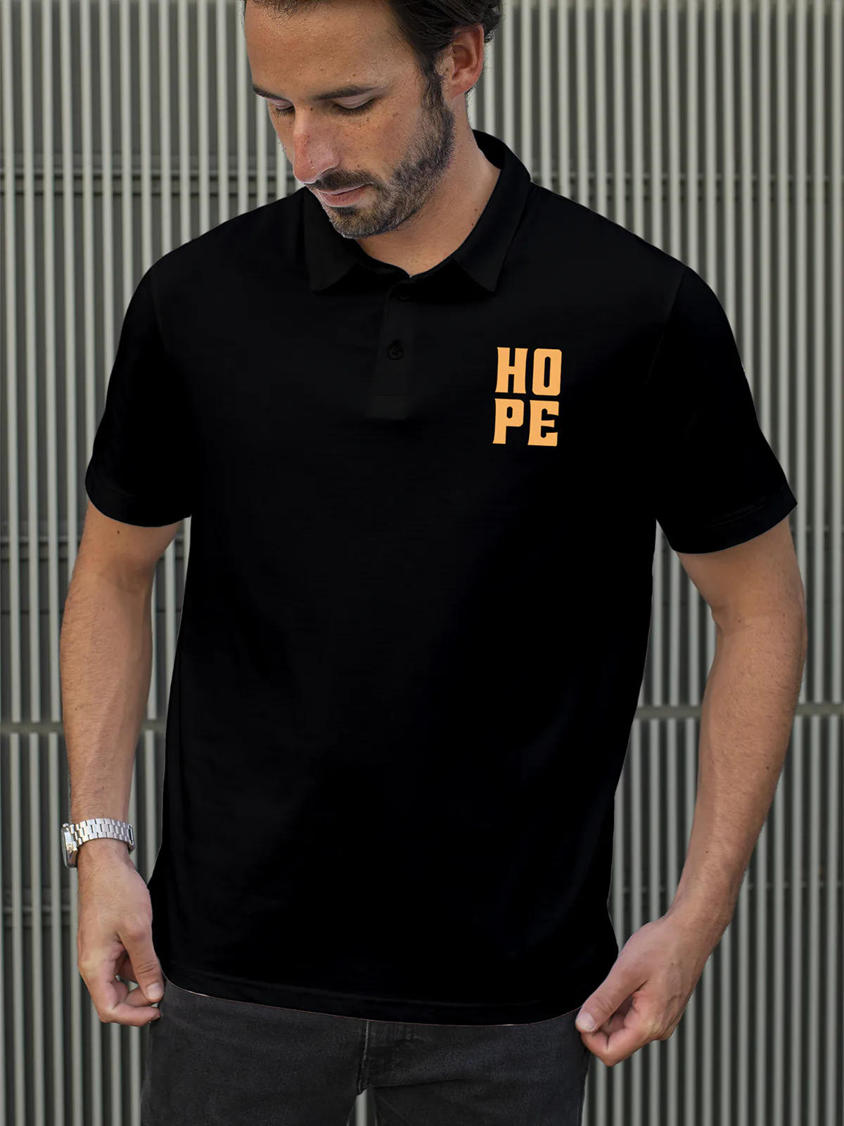 Model wearing Men's Black Polo T-shirt with 'Hope' design, offering effortless style and premium comfort