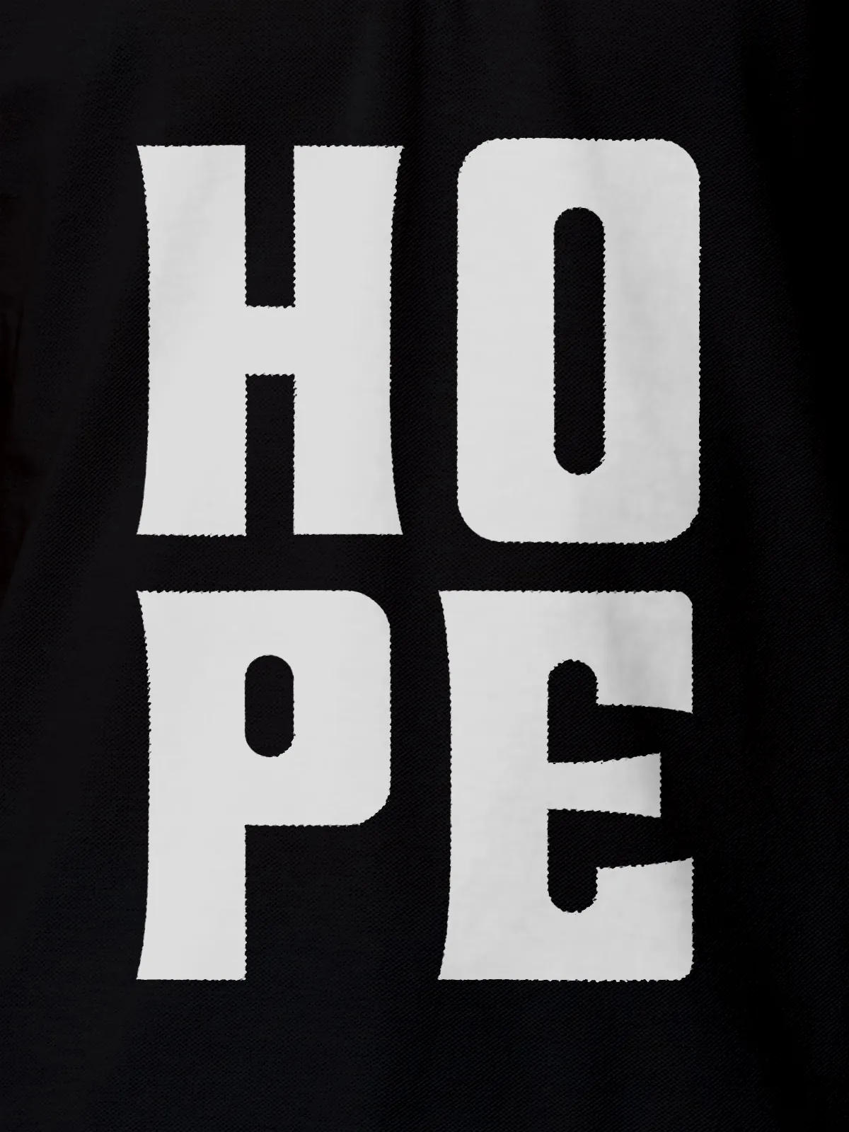 Close up of 'Hope' design on Women's Black Polo T-shirt, highlighting intricate details and vibrant print.