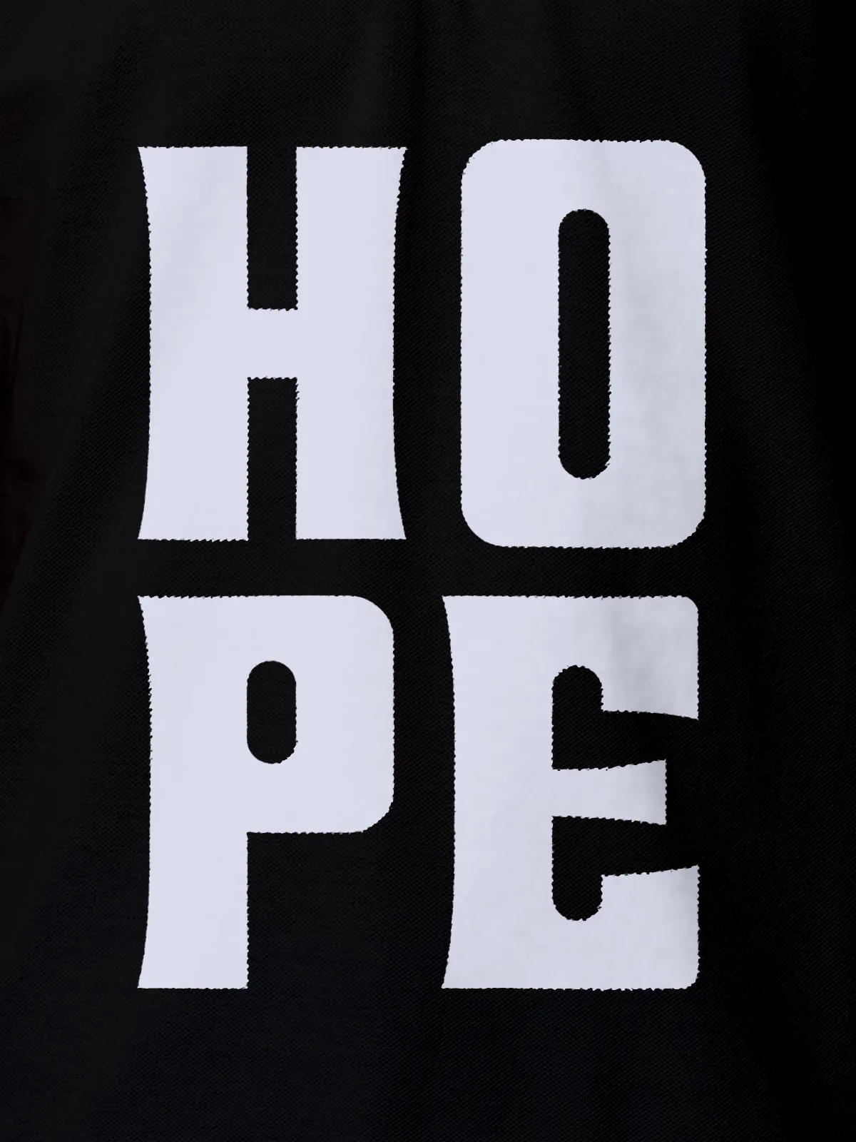Close up of 'Hope' design on Women's Black Polo T-shirt, highlighting intricate details and vibrant print.