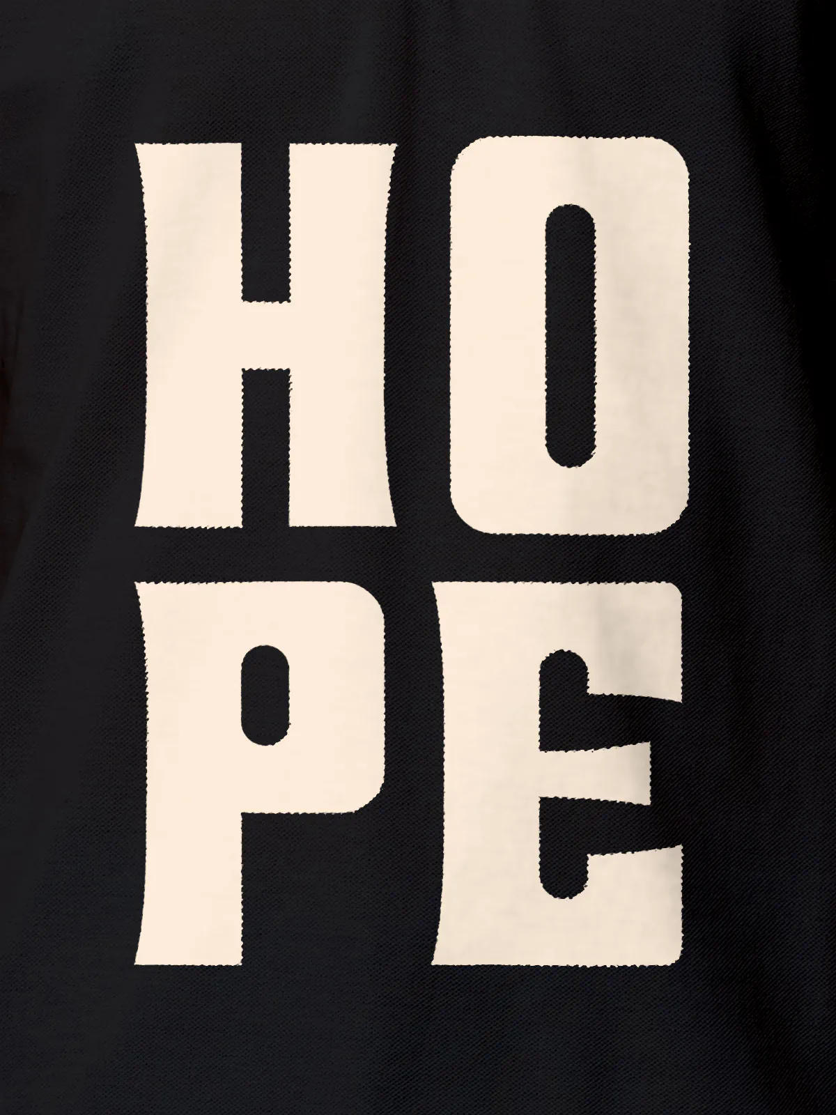Close up of 'Hope' design on Women's Dark Grey Polo T-shirt, highlighting intricate details and vibrant print.