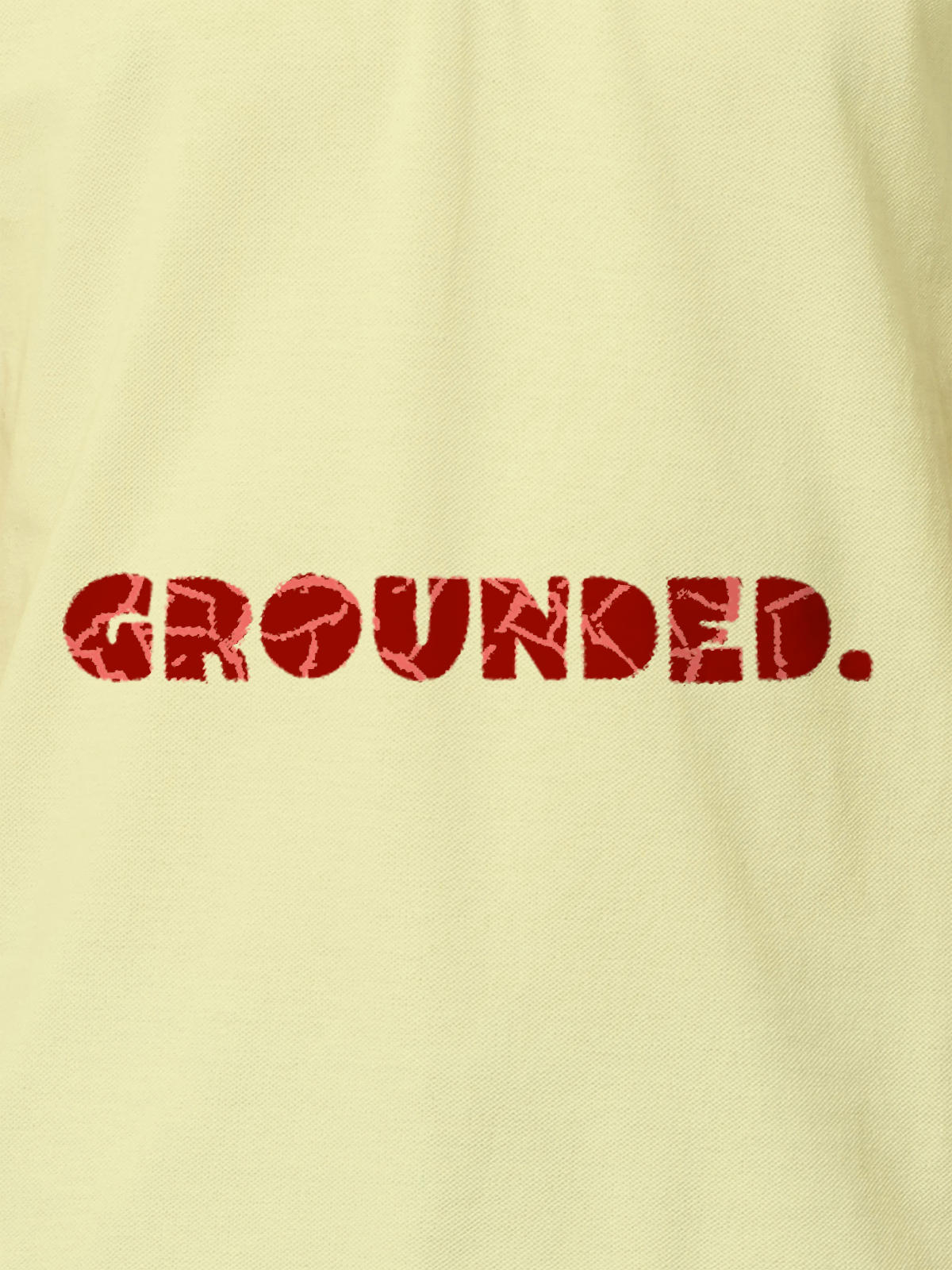 Close up of 'Grounded' design on Men's Yellow Polo T-shirt, highlighting intricate details and vibrant print.